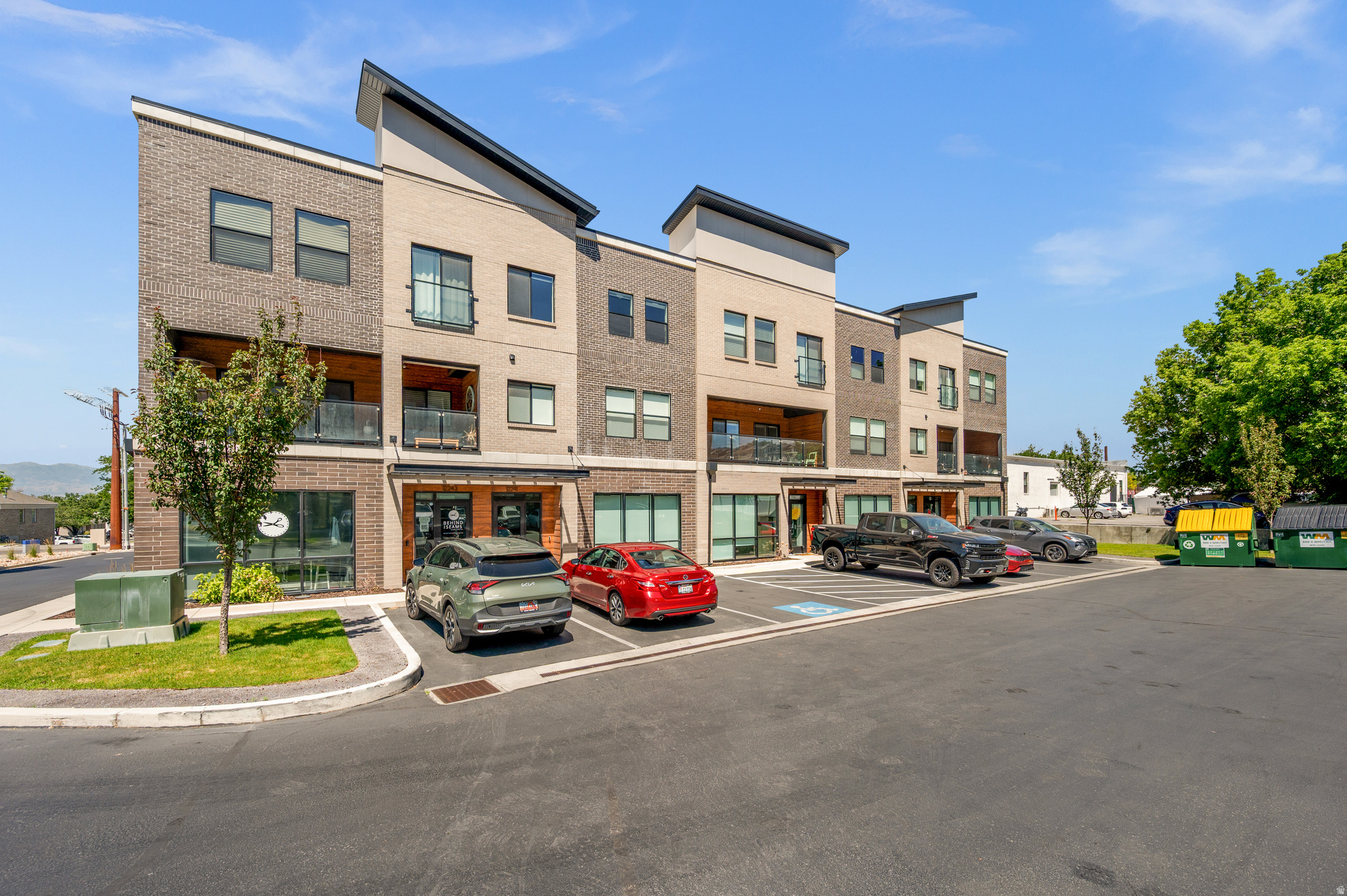 Work downstairs. Live upstairs. Build the life you actually want. One of only 15 in an exclusive, live/work development, this stunning Draper townhome is a rare find. The fully commercial-grade ground floor (approx. 600 sq ft) features an ADA-compliant bathroom, glass store-front windows, customer parking, and a private lockout entry ideal for a boutique office, studio, salon, therapy practice, or any client-facing business. Above the commercial suite, the residence delivers the lifestyle to match. High ceilings and premium finishes set the tone throughout, while custom built-ins, designer lighting, and motorized window shades on every window speak to a level of craftsmanship rarely found at this price point. The kitchen opens to a covered patio, perfect for morning coffee or an evening wind-down, and the 2-car attached garage adds everyday convenience. With 3 spacious bedrooms and thoughtful details at every turn, including a tankless water heater for on-demand efficiency, this home is as functional as it is beautiful.