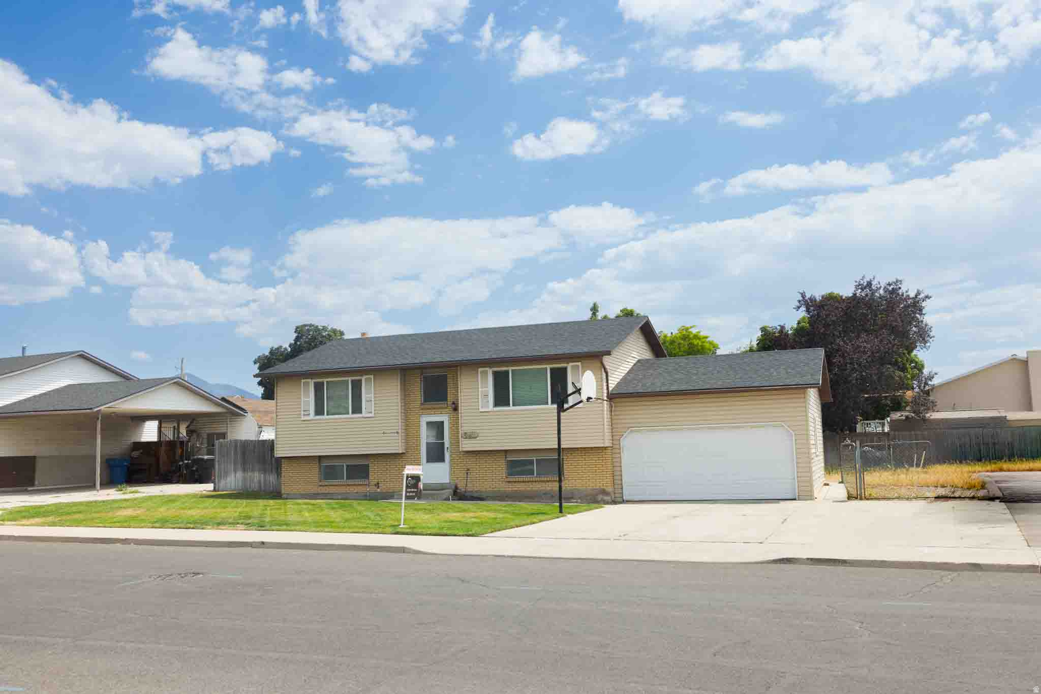 PRICED TO SELL QUICKLY!! New furnace, central air, water heater and roof! Updated full bathrooms! Large fully fenced yard at this centrally located home! Room to grow with a partially unfinished basement! Easy I-15 access! Make this home your own today! Square footage figures are provided as a courtesy estimate only and were obtained from county records.  Buyer is advised to obtain an independent measurement.