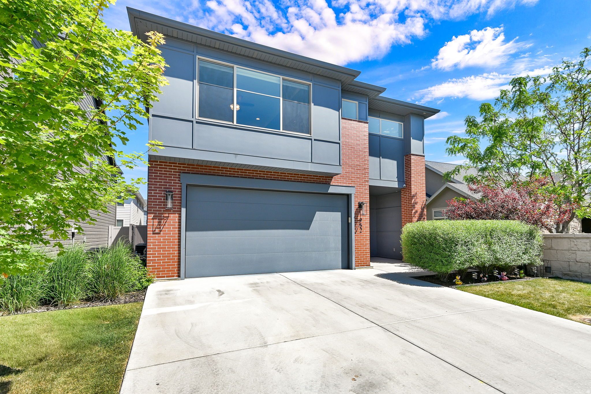 **Sellers willing to pay $10k towards closing costs**Welcome to one of the most upgraded and thoughtfully designed homes in Antelope's Edge. This former builder's home stands out with custom finishes, added functionality, and features you won't find in other homes in the neighborhood.  With 4 bedrooms and over 2,500 square feet, this home offers more space and flexibility than most nearby properties. The open-concept main level is highlighted by a stunning interior brick fireplace, creating a warm and inviting focal point for gatherings. The kitchen is both beautiful and practical, featuring a hidden oversized pantry that provides exceptional storage and organization.  Upstairs, the primary suite feels like a private retreat, complete with a custom bathroom including a soaking tub, large tiled walk-in shower, and generous storage. Additional upgrades include widened hallways, added storage closets, and a well-designed layout that maximizes livability.  Professionally tinted North and East facing windows enhance privacy while maintaining beautiful natural light throughout the home.  Step outside to a fully landscaped, low-maintenance backyard with professional turf and a custom dog run-perfect for easy living. The epoxy-coated garage with built-in shelving adds both durability and functionality.  Located at the end of a quiet street, this home offers added privacy while still being just steps away from HOA amenities including a playground, basketball court, and pickleball areas.  If you've been waiting for a home that offers more upgrades, more space, and better functionality than the rest-this is it.