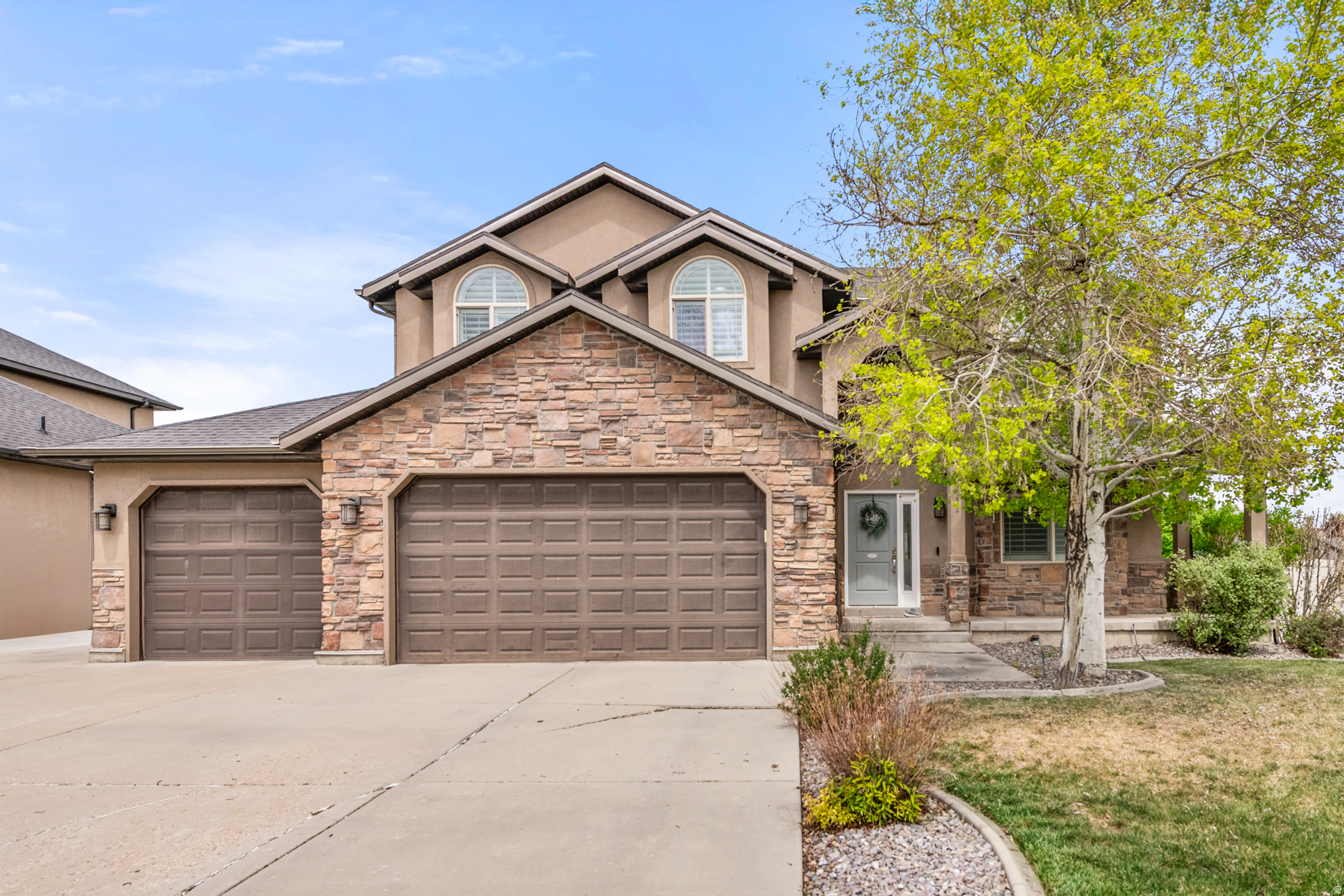 Welcome to this beautifully maintained home in the highly desirable West Jordan community. Ideally located in the center of the Salt Lake Valley, this property offers convenient access to shopping, dining, schools, parks, and major commuter routes, making it an exceptional place to call home. Inside, you'll find a spacious open-concept floor plan designed for both everyday living and entertaining. The updated interior features modern touches, comfortable gathering spaces, and a seamless flow between the kitchen, dining, and living areas. Step outside to enjoy the large patio, perfect for summer barbecues, relaxing evenings, or hosting family and friends. The generous 3-Car garage provides ample room for vehicles, storage and hobbies, while the cold storage area adds valuable extra space for food storage and organization. Combining location, functionality, and thoughtful updates, this home offers comfort, convenience, and room to grow. Don't miss the opportunity to own this move-in ready West Jordan gem.