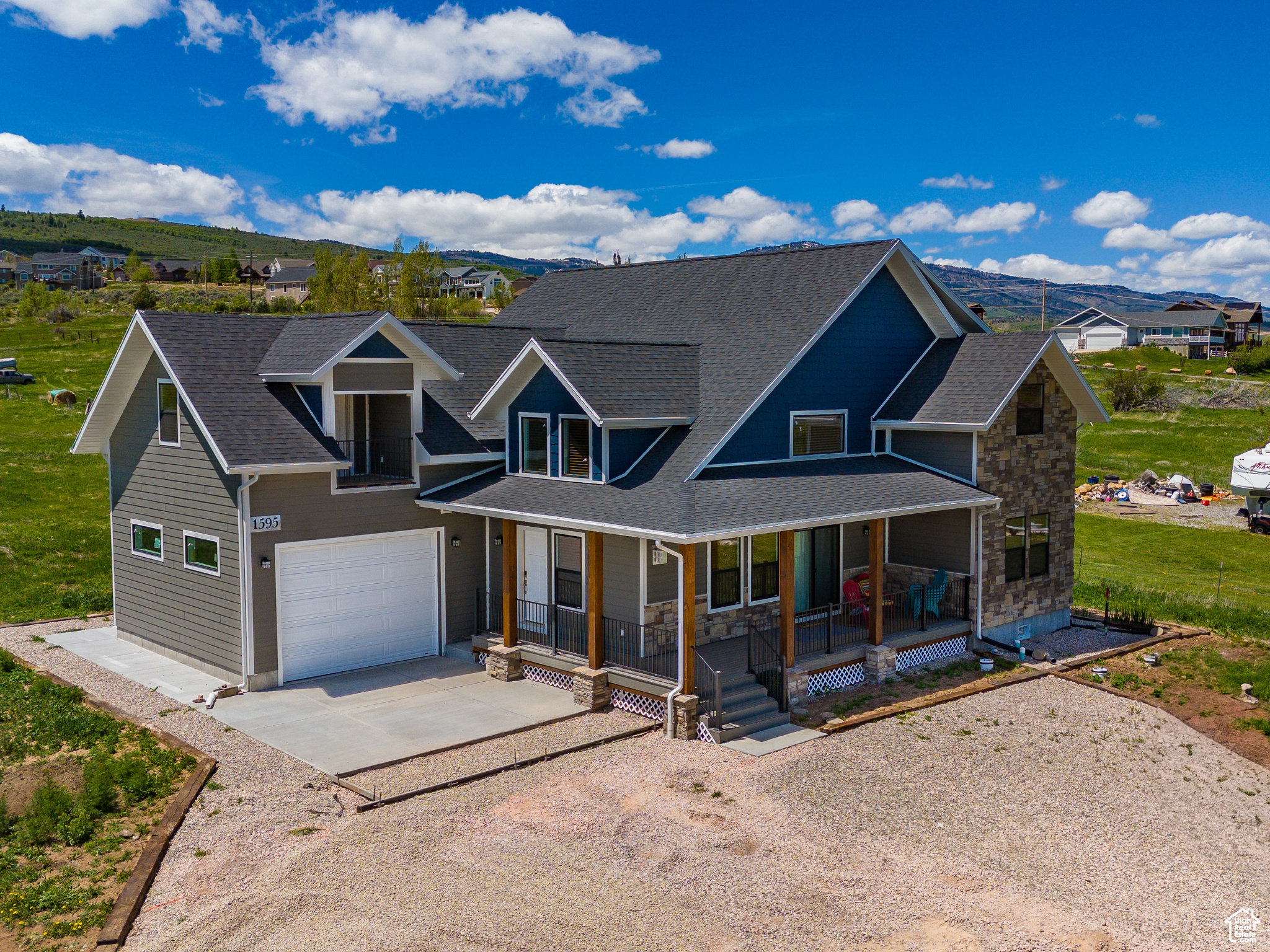 Gorgeous NEWer home just off Bear Lake Blvd on 2.3-ACRE horse property with LAKE & Mountain VIEWS! Only 2 miles on the bike path to the hub of Garden City for food/shopping, BEACH ACCESS, MARINA, Garden City FISHING Pond, Park & PICKLEBALL Courts! Minutes to Bear Lake GOLF COURSE or Hodges Canyon for ATV and SNOWMOBILE fun! BEAVER Mountain SKI in 20 minutes! Sold mostly furnished. Possible subdivide. Great Short-term rental property!  Square footage figures are provided as a courtesy estimate only. Buyer is advised to obtain an independent measurement.