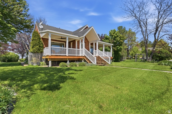 This is a must see Country Retreat for anyone who enjoys peaceful, country living!  The immaculate farm home was completely renovated and the owner's attention to detail is apparent in every room:  The spacious Kitchen features beautiful custom cabinetry throughout, marble countertops, Viking refrigerator and gas oven and a fireclay farm sink.  The charming Dining Room features custom cabinetry, a gas fireplace and scenic bay windows. The Primary bathroom includes heated floors, custom cabinetry, air bathtub and marble shower. There's a full  finished basement that includes heated floors in the tiled bathroom, pellet stove, gas furnace as well as central vac. The Office includes custom built-in cabinetry and desk. A cozy Den features reclaimed wood and a custom temperature-controlled wine cellar.  (Could be converted to cooled food storage room.) A new roof was added including front and back covered porches. An outdoor Sundance hot tub offers the perfect place to take in the views of Cache Valley and the surrounding mountains!.   The property includes a turn-key Horse Barn: Fully matted interior. Two-12 x 12 custom stalls with attached 12 x 24 pens, a 12 x 48 run-in (could be additional stalls) and hay and tack storage. Stall lights and fans on separate timers. Heated watering system. The property also includes three additional outbuildings including a four bay equipment shed with workshop and a tractor barn with additional craft shop and storage.  This 18.5 acre property includes lush pasture land, mature landscaping with plenty of fruit trees, (apple, pear, plum and cherry trees), as well as table grapes. and a large garden area. Worm Creek flows through the length of the property offering unparalled views of Cache Valley and the surrounding mountains!