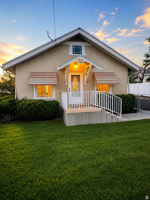 Beautifully remodeled single-family home on a huge lot in the highly desirable Spring Glen community! This charming 2-bedroom, 1-bath home features a new roof, central air, double-pane windows, gorgeous hardwood floors in the living and dining rooms, new carpet, an updated kitchen, and a finished basement bonus room, additional bathroom, and laundry area-offering plenty of flexible living space.  Outside, you'll find an impressive 24' x 30' oversized garage, an inviting outdoor patio with a fireplace, a fully fenced front yard with an automatic sprinkler system, and a large fenced, side pasture with its own frontage entrance. The property is well-equipped for livestock, hobbies, or recreational vehicles with a hay barn, corral, and covered awning for equipment or RV storage.  The pressurized irrigation and sprinkler system includes one water share of Spring Glen Canal Co. secondary water, providing efficient irrigation for the fully fenced, pasture and landscaping. Whether you're looking for room to expand, keep animals, store toys, or simply enjoy peaceful country living, this property offers endless possibilities.  Don't miss this rare opportunity to own a beautifully updated home with exceptional outbuildings, acreage, and amenities in picturesque Spring Glen. Owner/Agent.   Square footage figures are provided as a courtesy estimate only and were obtained from county records.  Buyer is advised to obtain an independent measurement.