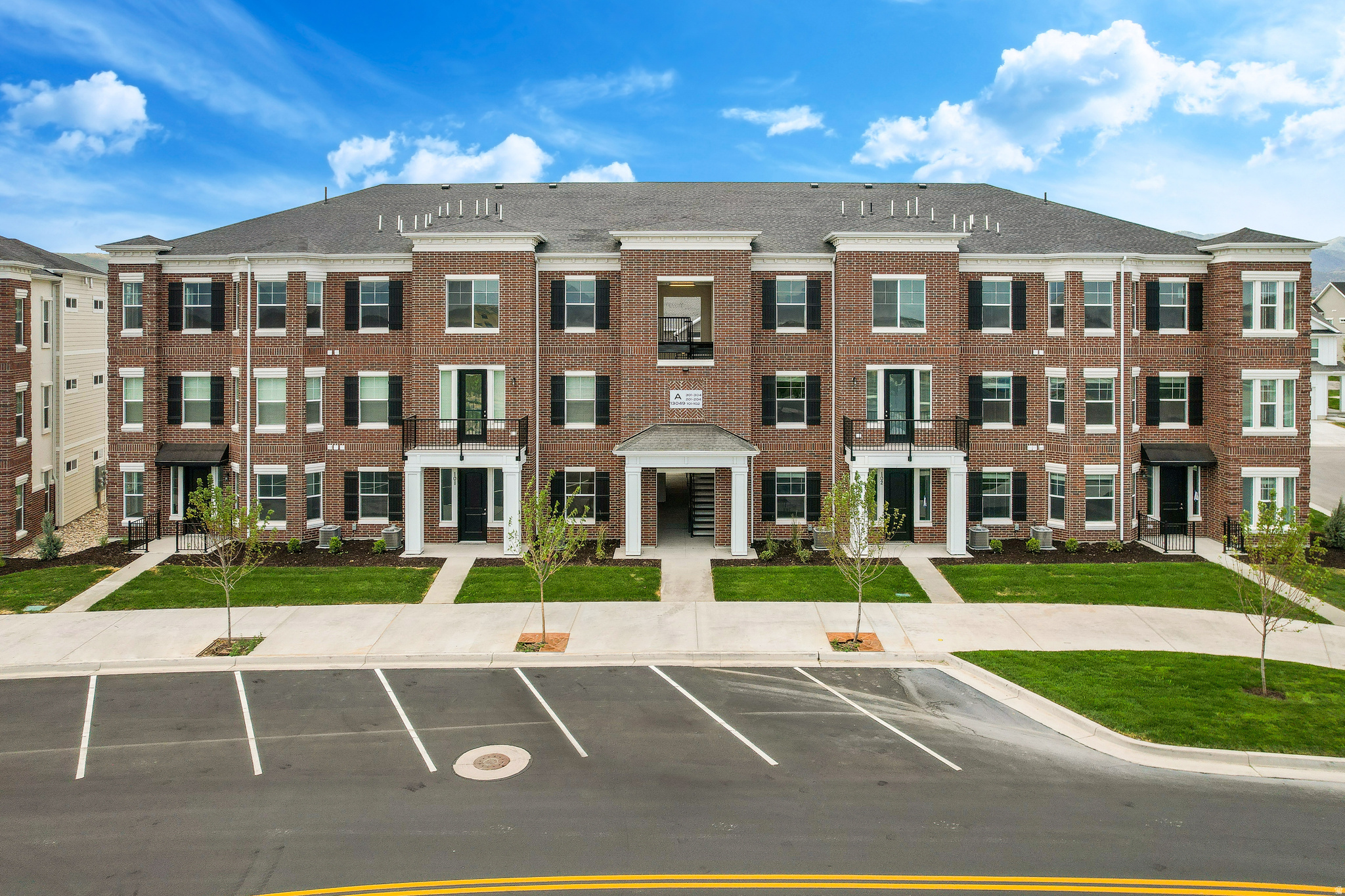Welcome to Parkside at Herriman Towne Center, where modern living meets unbeatable convenience. Ideally located in the heart of Herriman, this vibrant new condominium community places you just steps from everyday recreation, entertainment, and outdoor adventure. Enjoy direct access to J. Lynn Crane Park and the JL Sorenson Recreation Center, offering year-round activities, sports, fitness, and family fun right across the street.  Designed with lifestyle in mind, Parkside features beautifully planned community spaces including interconnected walking trails, a relaxing hammock park, playgrounds, and a sandbox for younger residents. Select ground-floor condominium units offer the rare opportunity for live-work flexibility, making it easy to blend business and home life in one convenient location.  Just minutes away, you'll find the shopping, dining, and entertainment destinations of Mountain View Village, while nearby mountain trails, parks, and recreation opportunities provide endless ways to enjoy Utah's outdoor lifestyle. Whether you're seeking a low-maintenance home, water softener, laminate floors throughout, and quartz countertops throughout well, an investment opportunity, or a place to put down roots, Parkside at Herriman Towne Center delivers the perfect combination of location, convenience, and community. Seller is offering $10,000 towards buyer's closing costs and pre-paids.