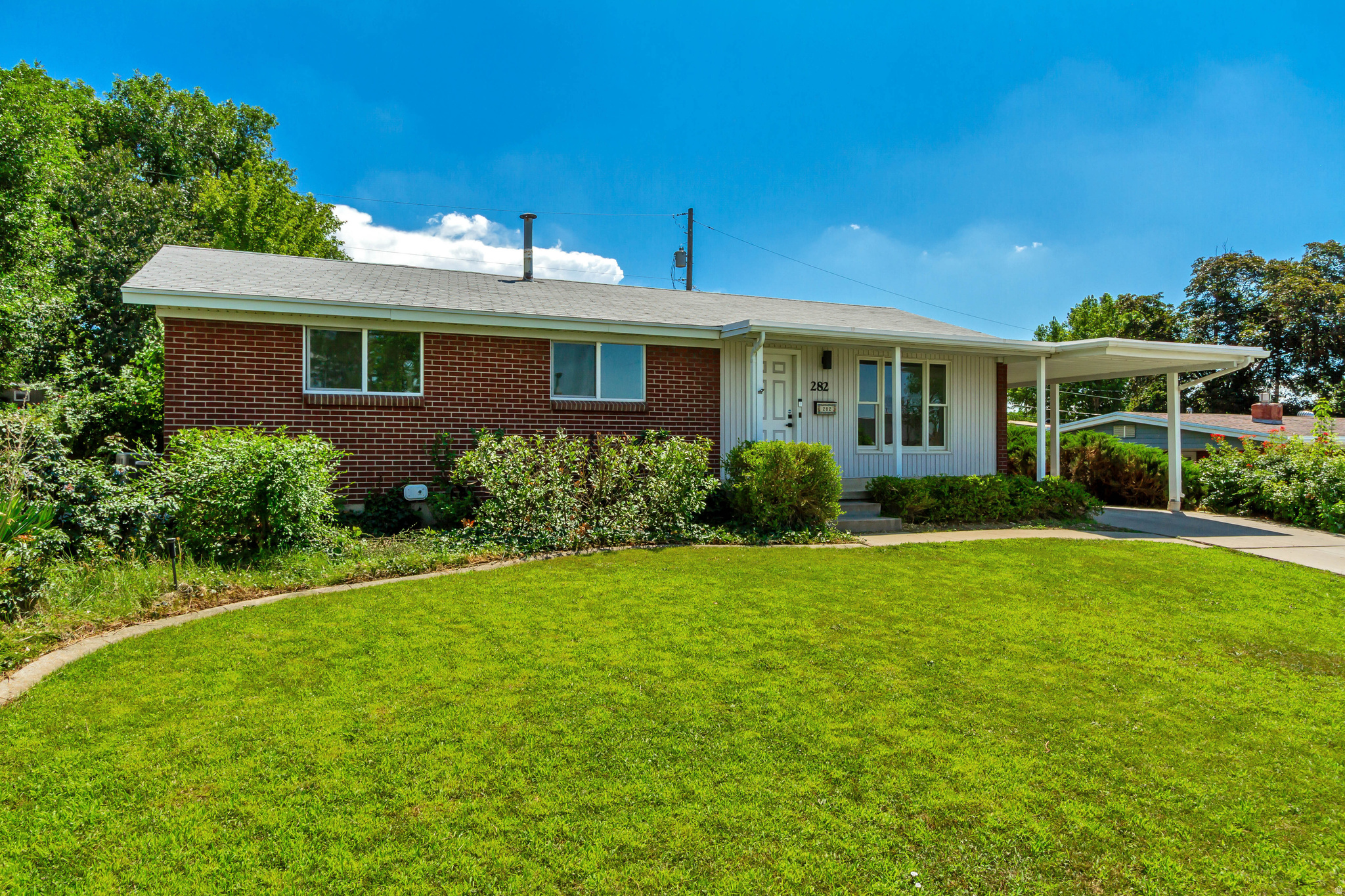 Fully remodeled and move-in-ready rambler in the heart of Bountiful! This beautifully renovated home features 5 bedrooms, 3 full bathrooms, and a bright, flexible floor plan designed to accommodate today's lifestyle. Experience the home before you visit! Take a 3D Matterport virtual tour by copying and pasting the link below into your browser: https://my.matterport.com/show/?m=4oJwz3pMZzf The stunning kitchen features premium quartz countertops with a full-height quartz backsplash, abundant cabinetry, brand-new stainless-steel appliances, a refrigerator with a built-in filtered water and ice dispenser, and an exterior-vented range hood. The dining area opens directly onto a spacious deck, creating the perfect space for entertaining, outdoor dining and relaxing. The spacious primary suite features soaring 10-foot vaulted ceilings, a spectacular wall of oversized windows with an elegant arched transom, two generous double-door closets, private deck access, and a spa-inspired en-suite bathroom with a stone resin soaking tub, custom walk-in shower, and a 72-inch double-sink vanity. The finished basement offers exceptional flexibility with a large family room, a dedicated storage room, two additional bedrooms, including an oversized flex room ideal for a guest suite, home theater, game room, fitness room, or home office, and a full bathroom. An extra-large utility room provides excellent space for a workshop, hobby area, or additional storage. Quality improvements include restored hardwood floors, LVP,  new electrical wiring, a new electrical panel, new plumbing, double-pane windows, recessed LED lighting with dimmer switches, plush new carpet, and beautifully remodeled bathrooms. Additional features include Quantum Fiber wiring, a Ring smart security system, a smart Wi-Fi thermostat, a GE water softener, and a Lennox Elite high-efficiency furnace. Enjoy beautifully landscaped grounds with mature trees, colorful rose bushes, secondary irrigation water, and a programmable Rain Bird irrigation controller. Conveniently located near Bountiful's scenic East Bench, the home offers easy access to the Wasatch Mountains, top-rated schools, shopping, dining, parks, and commuter routes.  Square footage figures are provided as a courtesy estimate only and were obtained from County Records. Buyer is advised to verify all information regarding the home and property.
