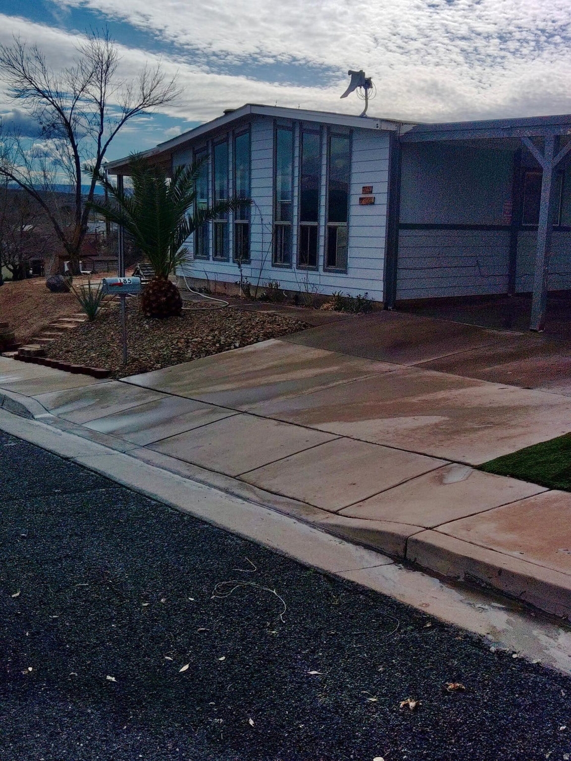 Enjoy breathtaking views of the St. George Temple and stunning Southern Utah red mountains from this beautifully maintained 3-bedroom, 2-bath home situated on a desirable corner lot. This property offers the perfect blend of comfort, functionality, and lifestyle. The newly renovated kitchen features modern finishes, updated cabinetry, and ample counter space--ideal for everyday living and entertaining. Step outside and you'll find a backyard designed to enjoy Utah's natural beauty. Relax under the charming gazebo while taking in the mountain views, cultivate your own produce in the dedicated garden area, or enjoy year-round comfort in the detached shop complete with A/C and power--perfect for projects, hobbies, or additional workspace. The home also includes RV parking and a powered workshop, offering exceptional flexibility for outdoor enthusiasts and hobbyists alike. With its rare temple views, red rock backdrop, corner lot location, and upgraded features throughout, this home truly captures the best of St. George living. Square footage figures are provided as a courtesy estimate only and were obtained from _County Records_____________ .  Buyer is advised to obtain an independent measurement.