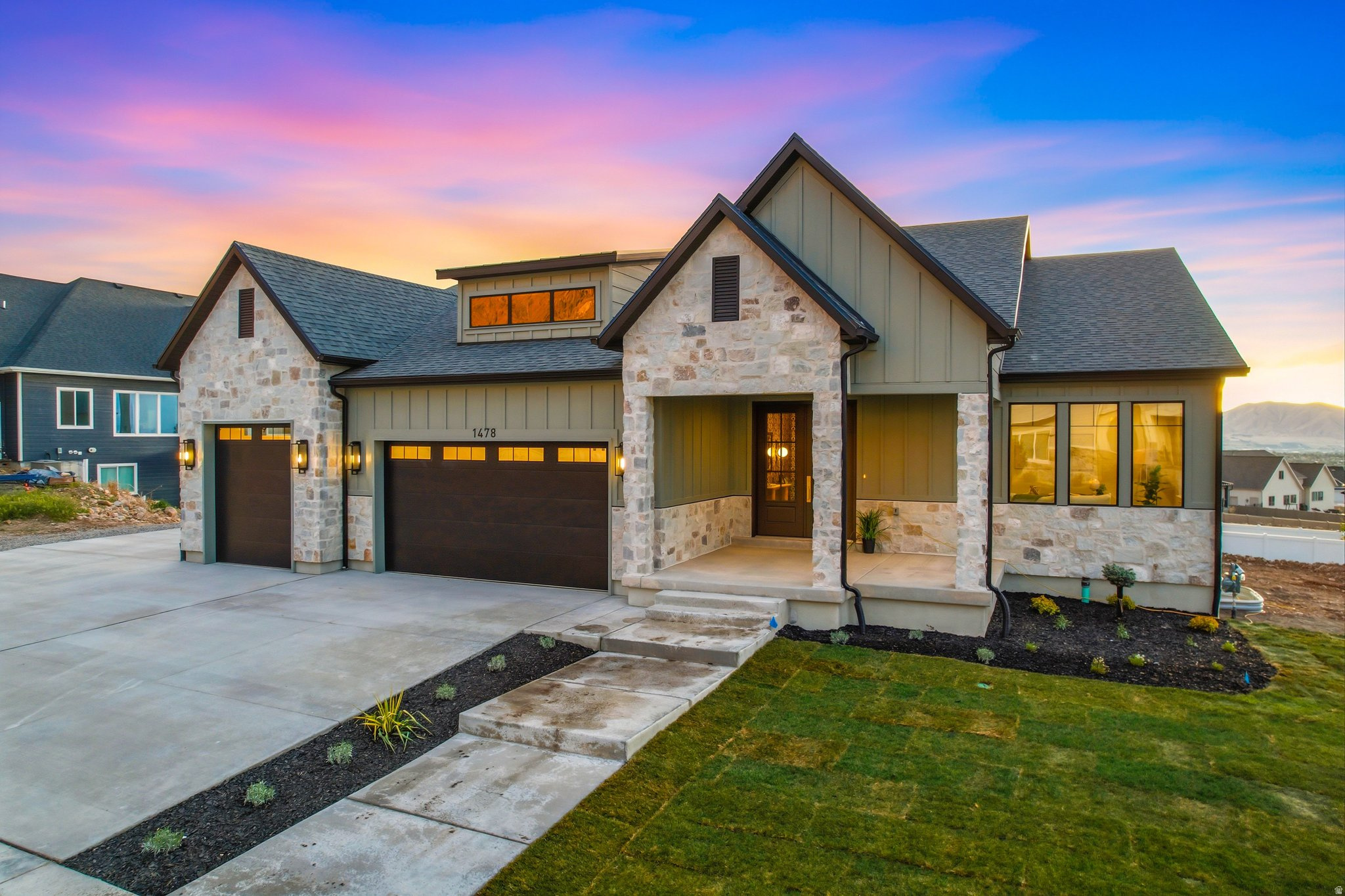 Sweeping Valley Views. Organic-Modern Design. Fully Custom Luxury. Designed in collaboration with JT Homes and Madison Ditton Interiors, this exceptional home was created for entertaining and multigenerational living. A private apartment-style suite with separate entrance and dedicated HVAC, along with a finished basement kitchenette, offers flexibility for guests, extended stays, or independent living. Views from every level. The main floor showcases open, light-filled gathering spaces, warm white oak cabinetry, KitchenAid appliances, and seamless indoor-outdoor flow to an expansive deck and patio overlooking the valley. Thoughtful upgrades include zoned heating, tankless water heater, 3 laundry hookups (main, master closet, and ADU closet), insulated garage walls and attic, epoxy-coated utility room, custom baseboards, upgraded insulation, plumbed for radon mitigation, French drain, and hot tub wiring. Set on a .40-acre lot with a 3-car garage, this move-in-ready luxury home delivers elevated design, custom craftsmanship, and an unforgettable setting to gather, host, and take in the view.   Square footage figures are provided as a courtesy estimate only and were obtained from floor plans.  Buyer is advised to obtain an independent measurement.