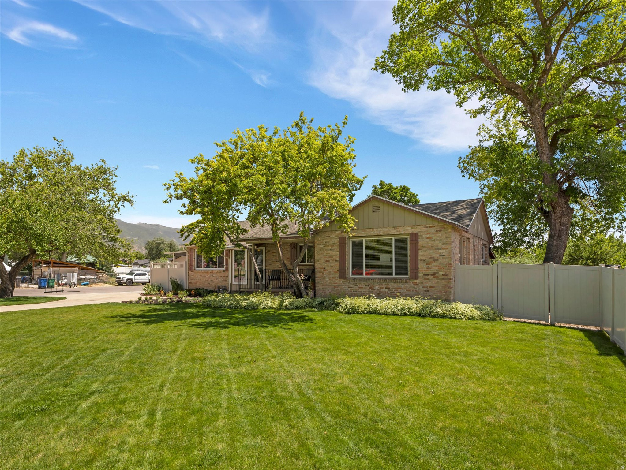 HISTORIC KAYSVILLE CHARM * WALK TO GAILEY PARK & DOWNTOWN * ACCESSIBLE MAIN-LEVEL LIVING * BASEMENT APARTMENT. Here's your opportunity to own a home in Kaysville's charming historic district, just down the street from where renowned Utah artist LeConte Stewart once lived. The thoughtfully remodeled kitchen and primary bathroom were designed with accessibility in mind, featuring a spacious roll-in shower and the convenience of a full-size stackable washer and dryer in the primary suite. Situated on a large, beautifully maintained lot with mature landscaping, the property also features a new automatic sprinkler system. Major updates provide peace of mind, including newer windows, furnace, air conditioning, and water heater. The fully functional basement apartment offers outstanding flexibility with its own private exterior entrance, kitchen, separate bedroom, washer and dryer, recessed lighting, and has been recently prepared for new finishes. Enjoy being just a short stroll from Gailey Park and only blocks from charming downtown Kaysville, where you'll find local shops, restaurants, community events, and the small-town atmosphere that makes this neighborhood so special. Lovingly cared for by the same family for the past 45 years, this home is filled with warmth, character, and lasting memories.