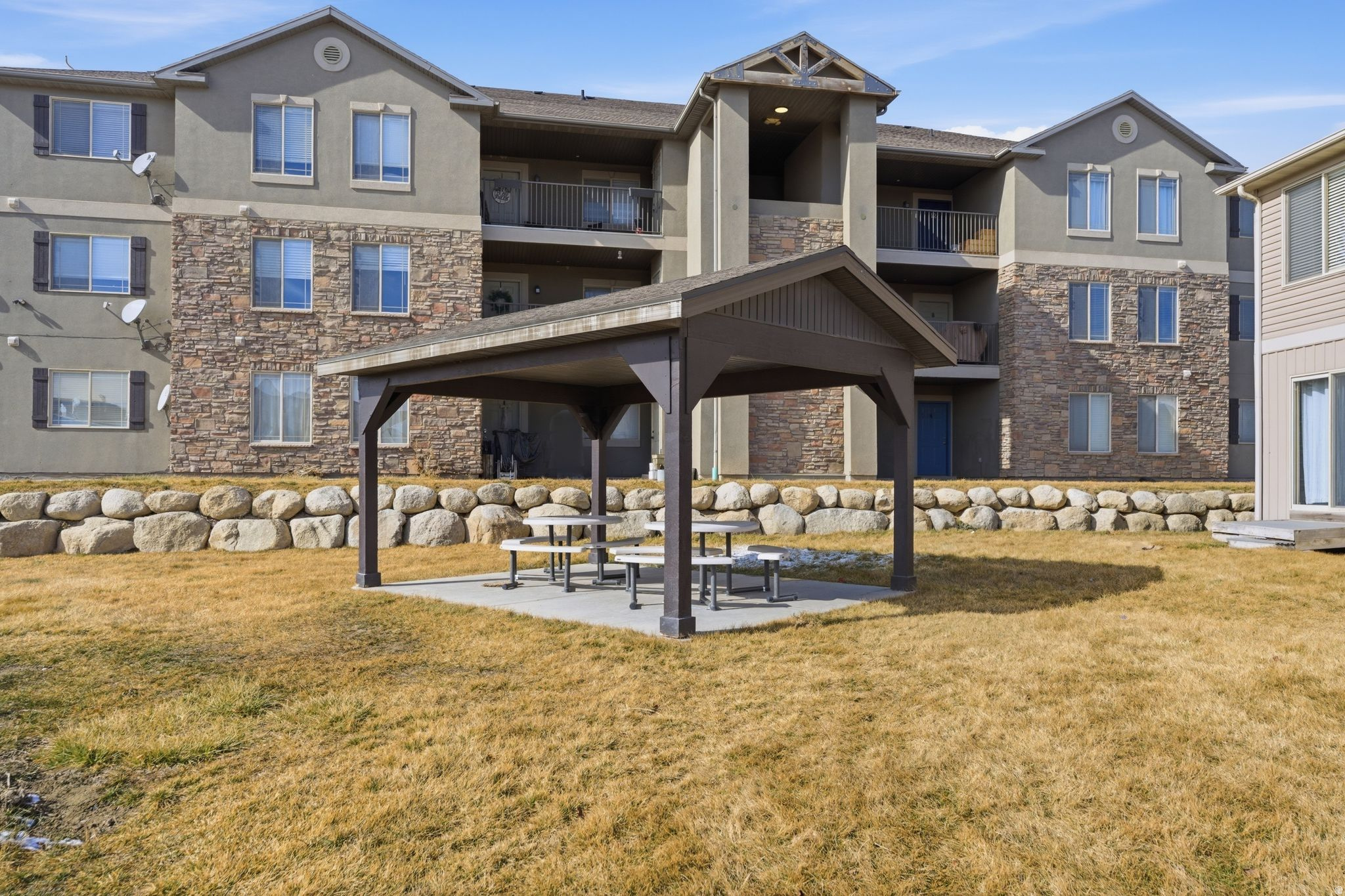 Welcome to this light filled 3 bedroom, 2 bathroom condo in the heart of Eagle Mountain. What stands out immediately is the spacious great room. It truly feels open and comfortable, with room to live, gather, and relax. The primary bedroom is also generously sized and offers a peaceful retreat at the end of the day. The unit enjoys beautiful mountain views and a quiet, more private setting within the community. You are just minutes from shopping, dining, parks, and everyday conveniences, while still feeling tucked away from the noise. For first time homebuyers, this property may qualify for Eagle Mountain City's program offering up to $25,000 toward down payment and closing costs. Reach out for details on how that works.