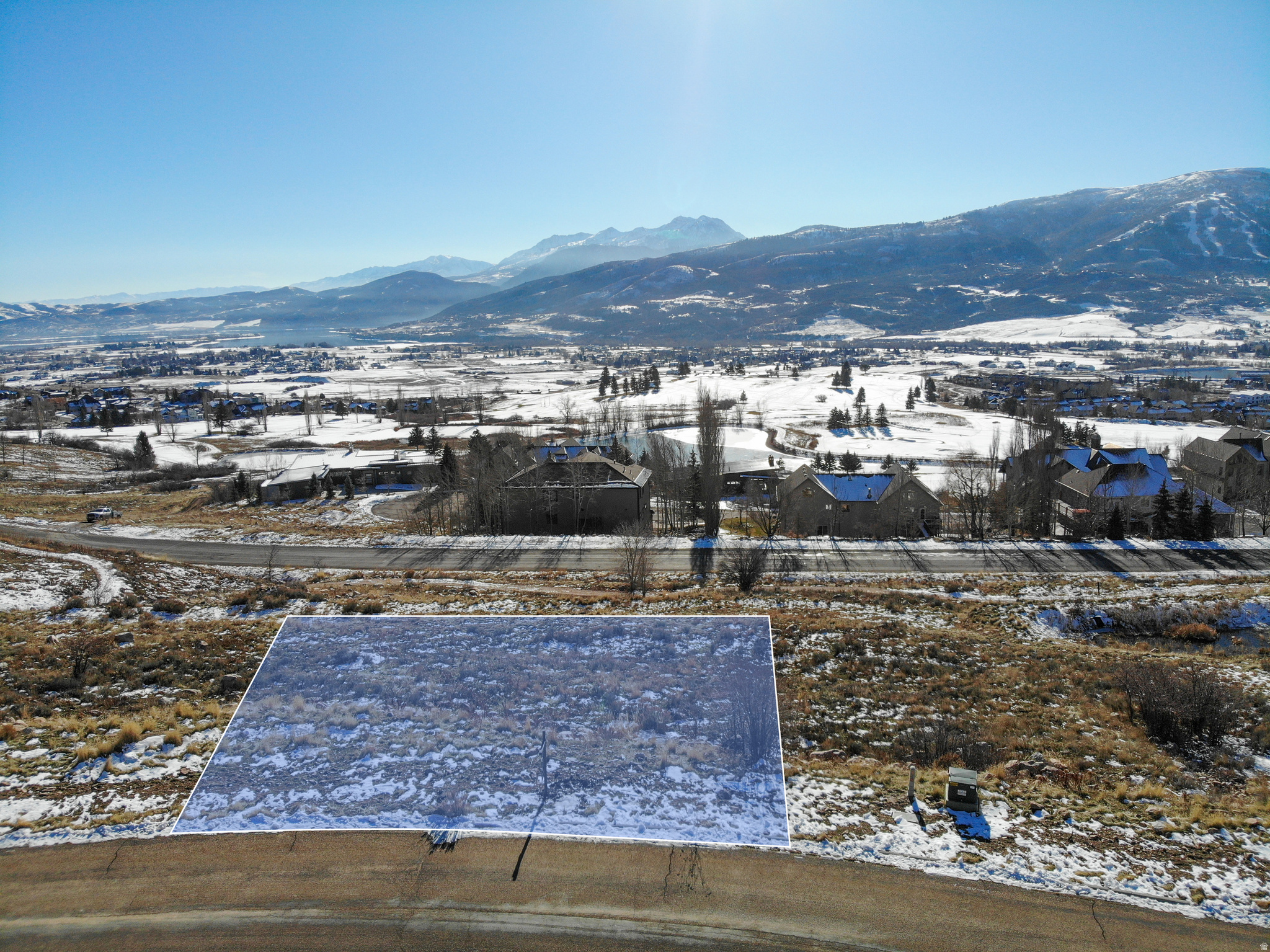 With panoramic, unobstructed views of the entire Ogden Valley, this is one of the few remaining lots in the area with spectacular views where you can build your mountain dream home! The property is in the desirable Retreat community and sits atop the Wolf Creek Resort. The property features direct views of the golf course, Mt. Ogden, Nordic Valley Ski Resort, Pineview Reservoir, and the expansive Wasatch mountain range. The lot is just seconds from the golf course, gym, and members lounge at the Wolf Creek Resort. It is also just minutes from Powder Mountain, Snowbasin, Pineview Reservoir, and dozens of hiking and biking trails. All water and sewer impact fees have been paid with the lot, which is over a $40k value! The lot also comes with beginning house plans that are subject to HOA approval. Reach out today for more information or to walk the property! The seller is offering a delayed closing on this property to coordinate a 1031 exchange at no cost to a buyer. Seller will assist as necessary with permits or any additional items needed prior to closing. Buyer to verify all.