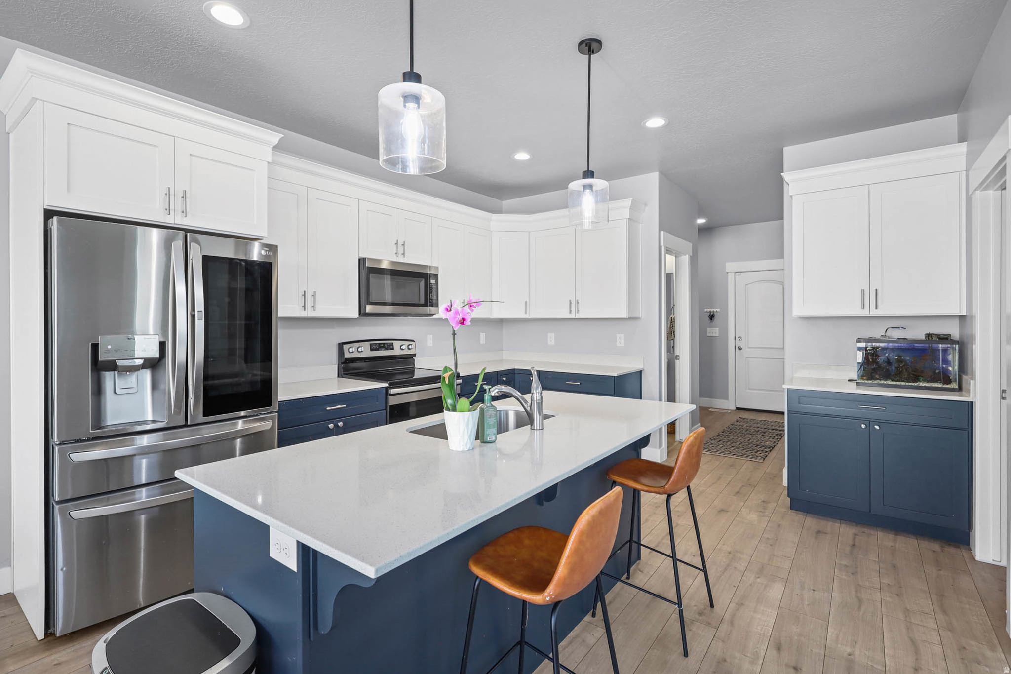 **CREATIVE FINANCING AVAILABLE ON THIS HOME** Contact listing agent for more information. Move-in-ready Saratoga Springs home with space, style, and upgrades throughout! This desirable floorplan features a main-level office/den with double glass doors, a bright open-concept kitchen with quartz countertops and oversized island, and a stunning 2-story vaulted great room-perfect for gathering and entertaining. Extra-height triple-pane sliding doors open to a rare .30-acre lot backing to open space, offering privacy and room to relax. Upstairs includes 4 spacious bedrooms, a versatile loft, and convenient same-level laundry. Enjoy 9 ft ceilings, energy-efficient 2x6 construction, zoned HVAC with dual thermostats, a mudroom, and abundant natural light. 3-car garage with RV parking potential and 220V outlet-ideal for toys, tools, or EV charging. Convenient access to Mountain View Corridor, close to parks, schools, outdoor recreation, and a community pickleball court. A perfect blend of comfort, function, and modern living-this home is a must-see! Square footage figures are provided as a courtesy estimate only and were obtained from county records. Buyer is advised to obtain an independent measurement.