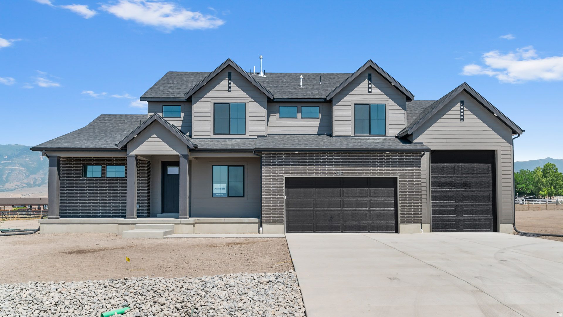 ROCHESTER FLOORPLAN IN THE MAJORS IN EAGLE MOUNTAIN ON .48 OF AN ACRE.  This home will be completed in August 2026.  Get up to $6000 in closing costs with our preferred lender.  The main floor owner's suite has it all: tray ceiling, large walk-in closet with stackable laundry connection, double undercounter sinks, soaker tub and oversized shower. Get cozy in the large family room around the fireplace. The open concept kitchen includes a large island for food prep/counter seating, a large walk-in pantry, kitchen with gas cooktop, double ovens (not pictured in photos) 42" upper cabinets w/ crown molding, 30" Single sink, upgraded cabinet with dovetail, soft-close features. Laminate floor throughout the kitchen, dining, & family room. Quartz countertop in kitchen and bathrooms, Powder room located next to the garage entry and mud room bench. Stair railing with newel posts. Office with double doors.  Upstairs has a loft, 3 large bedrooms, full bathroom, and full laundry room. Home includes unfinished basement with 9' foundation walls, room for a large family room, 2 additional bedrooms, a bathroom, and under porch storage. 2 95% efficient furnaces, 50-gallon water heater, & plumbed for a soft-water system. 3-car RV garage with 12' x 10' door and extra space on the side of the garage to add an RV pad. Sitting on a .48 ACRE, this home has it all!  Ask me about our generous home warranties, active radon Mitigation System, and Smart Home Package, which is included in this home. The actual home may differ in color, material, and/or options. Pictures are of a finished home of the same floorplan, and the available home may contain different options, upgrades, and exterior color and/or elevation style. Square footage figures are provided as a courtesy estimate only and were obtained from building plans. No representation or warranties are made regarding school districts and assignments; please conduct your own investigation regarding current/future school boundaries.   *****Please note, the kitchen is different from photos.  The kitchen is our Deluxe Luxury Kitchen and will have double ovens and a separate cook top and many other beautiful features.