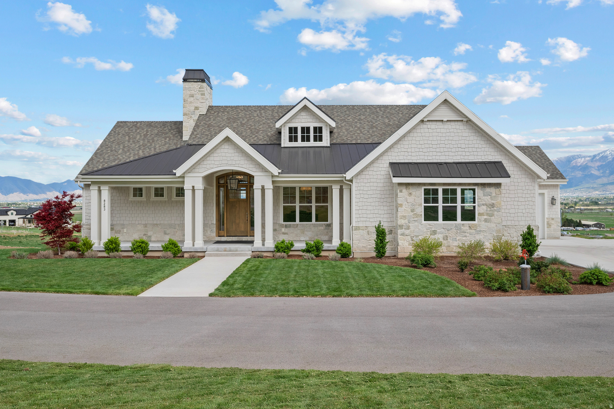 WATCH VIDEO WALK THROUGH TOUR.  Luxurious custom home completed in 2023, offering refined country living on 5.25 acres, 4 acres of which are planted in alfalfa. Nearly off-grid with a productive well, septic system, two 1,000-gallon propane tanks, and backup generator. Fully finished with exquisite trim carpentry and custom cabinetry throughout. High-end mechanicals include dual carrier furnaces, two water heaters, Bull Water Integration system, and fire suppression. Massive 1,200+ sq ft garage, incredible views, and room to build, farm, or create your dream setup. Replacing this property would cost far more than buying it today.  Save yourself the hassle and money of starting from scratch.  Includes 9 water shares from Strawberry Water Association and .45 ACFT water right.  Buyer to verify.