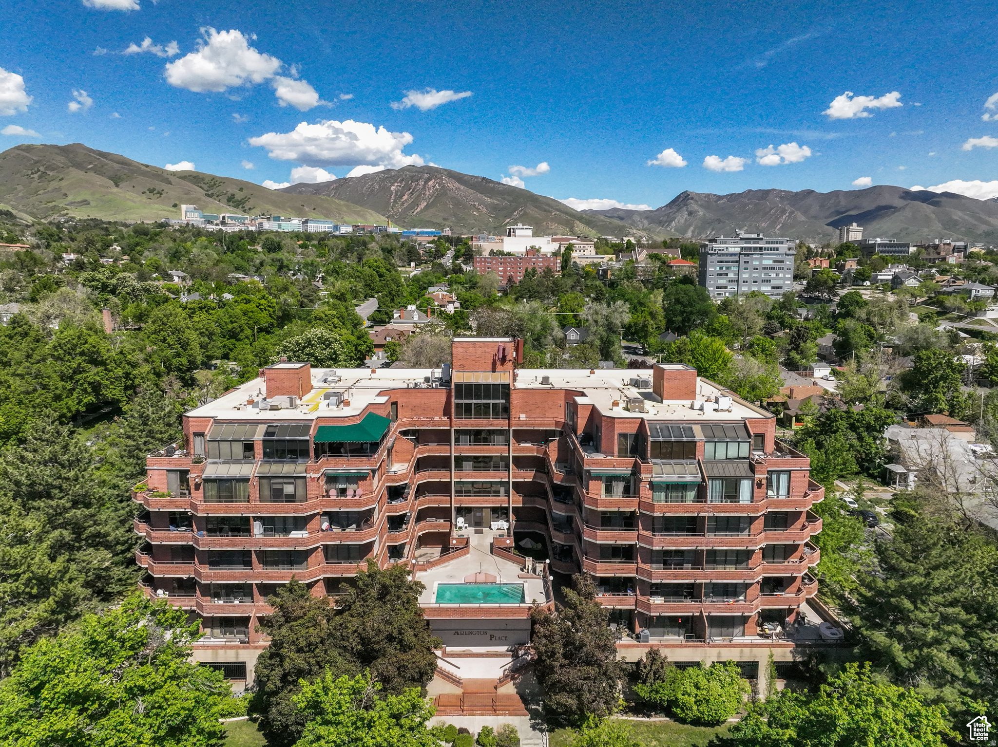***Seller Finance or rent-to-own Options*** Location, light, and views make this condo truly special. Perfectly situated within walking distance of the University of Utah and just minutes from downtown and 9th & 9th, this is an ideal spot for student housing, a smart rental investment, or a great place to call home. The flooring, paint, and kitchen are all brand new. The south-facing unit provides natural light year-round, and two sliding glass doors open to a private patio with sweeping views of the valley, the Oquirrh Mountains, and downtown. Watching the sun set from the balcony might just become your new favorite hobby. Inside, you'll enjoy the convenience of an in-unit washer and dryer and a covered parking stall. The building also offers great amenities, including a secure entrance, pool, hot tub, gym, sauna, and clubhouse. Whether you're looking for a convenient place to live or a solid investment, this condo delivers on every level. Check out the 3D tour above.