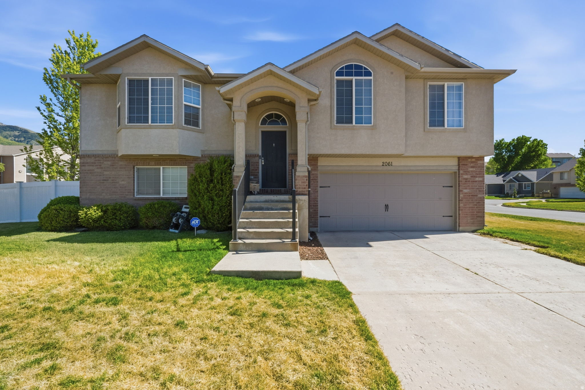 This beautifully maintained home with a new roof (2025), AC/Furnace (2021), Vinyl Floors (2022), and Carpet (2019) in South Weber offers the perfect blend of space, comfort, and convenience. Featuring a bright, open-concept kitchen with new appliances, and the spacious floor plan is filled with abundant natural light, creating an inviting atmosphere ideal for entertaining or simply relaxing at home. Step outside and take in the stunning mountain views while enjoying a barbecue on the deck. Updated sprinkler system valves with Wifi control panel. Water your yard with the secondary water, included in your taxes. Nestled in a desirable neighborhood with a great park just down the street, this home also offers quick access to Hwy 89-putting you just minutes from local dining, shopping, outdoor recreation, and other popular destinations in the area. THIS IS A MUST-SEE HOME.