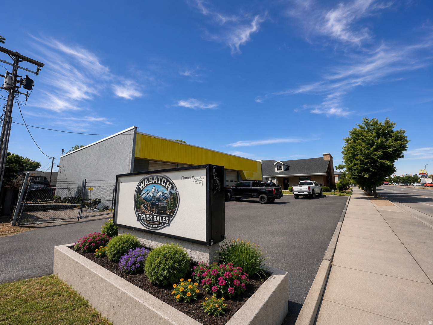 Exceptional opportunity to own a turn-key auto body repair facility designed for high-volume automotive service. This well-equipped commercial property features 8 mechanic bays,an oversized paint booth along with a mezzanine/storage area, and a secure fenced yard, providing ample space for operations, equipment, and inventory.  Strategically located on highly traveled 3500 South, the property benefits from exposure to 45,000+ vehicles per day (VPD), offering outstanding visibility for your business. Conveniently situated less than three miles from Valley Fair Mall and Fairbourne Station, this location provides easy access for customers and employees alike.  Whether you're expanding an existing operation or launching a new venture, this versatile property offers the ideal combination of functionality, visibility, and location to support your success.  Square footage figures are provided as a courtesy estimate only and were obtained from Tax Records .  Buyer is advised to obtain an independent measurement.