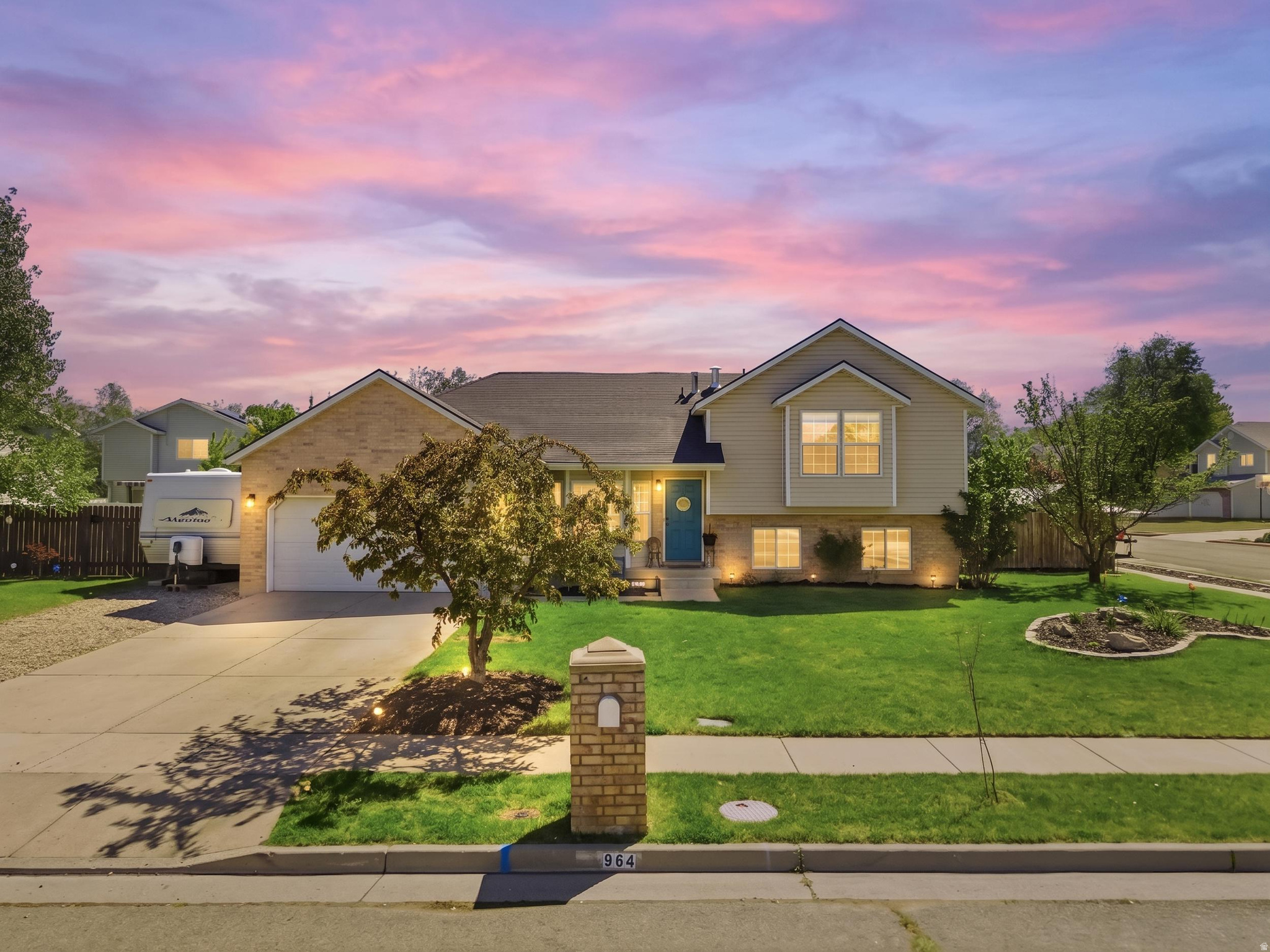 Welcome to this beautifully maintained home in Clinton, ideally located near Hill Air Force Base with quick access to shopping, dining, and the freeway making the perfect combination of comfort and convenience.  The fully landscaped yard is ready to enjoy from day one, featuring mature trees, established fruit trees, and a thriving garden. Out back, your private retreat awaits - complete with a built-in outdoor fireplace perfect for cozy evenings, entertaining guests, or relaxing under the stars.  Nestled in a neighborhood that loves the holidays, has strong community spirit and vibrant seasonal traditions, this is a wonderful place to put down roots and create lasting memories.  Located near Clinton Elementary School and Sunset Junior High - this one checks every box. Come see it for yourself!  Square footage figures are provided as a courtesy estimate only.  Buyer is advised to obtain an independent measurement.