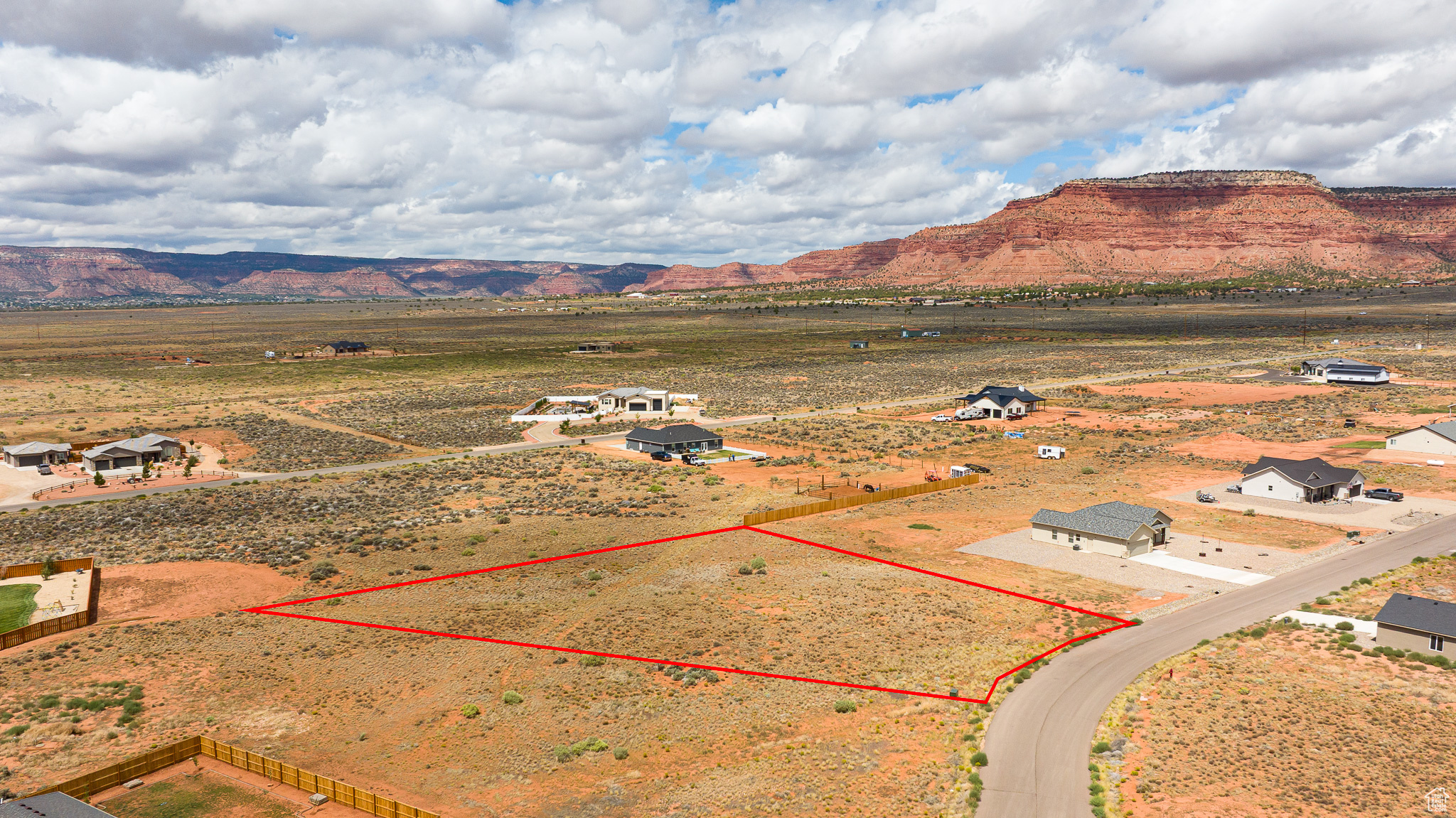 Don't miss this rare opportunity to own a 1-acre lot in the highly desirable Crimson Estates subdivision, where scenic beauty meets modern convenience. This spacious property offers paved road access and is perfectly situated with easy routes to town via Mountain View Drive or Hwy 89. Enjoy the benefits of county living with no impact fees, while being just minutes from the heart of Kanab City. Utilities are already at the property line, and the lot is connected to Kane County Water Conservancy, making your build process even smoother. Additionally, building plans are available for the new buyer, providing a head start on creating your ideal home. Whether you're dreaming of wide open spaces with Red Rock views, room for horses, or simply a peaceful retreat under the stars, this property delivers. With limited lots remaining, now is the time to secure your place in this serene and sought-after area. Come envision your custom home in the beauty of Southern Utah - this could be the perfect spot for your next chapter! (Buyer to verify all)