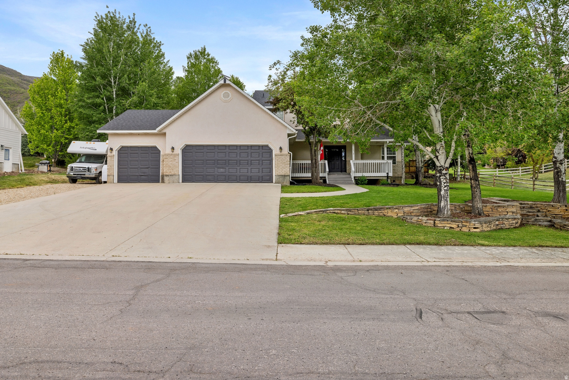 Ideally located along the east side of the Wasatch Mountains in Midway, this two-story home offers an ideal floor plan for a variety of buyer profiles. Featuring 3 bedrooms upstairs and a spacious primary suite on the main level, the layout provides both comfort and functionality. The large family room flows seamlessly into the kitchen, creating the perfect space for entertaining.  Situated on a private oversized lot with no HOA, the property also offers RV parking and plenty of storage with a 3-car garage plus a 30-foot storage container that is included. Enjoy peaceful mornings on the front porch with beautiful mountain views. The unfinished basement is ready for your future plans and customization.