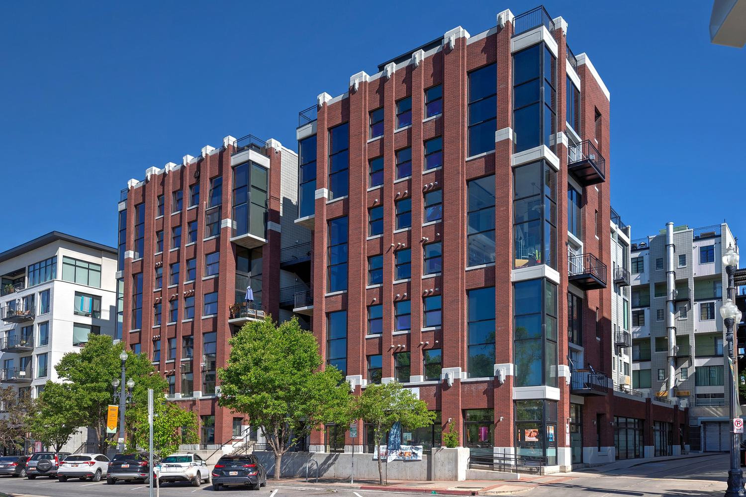 Experience the energy of urban living in this s industrial-style loft in the heart of Downtown Salt Lake City. Featuring 2 bedrooms, 1.5 baths, soaring ceilings, exposed industrial details, and an interior garage door that opens directly to the outside, this one-of-a-kind residence seamlessly blends modern city living with edgy architectural design. Perfectly positioned across from the Pioneer Park, which is in the process of being revitalized, you'll enjoy immediate access to downtown's vibrant lifestyle including the renowned Downtown Farmers Market, local coffee shops, nightlife, breweries, art galleries, and some of Salt Lake's most sought-after dining destinations. Just minutes from The Gateway, City Creek Center, Siegfried's Delicatessen, Ivy & Varley, and the rapidly growing Granary and Post Districts, this location is ideal for professionals, creatives, and anyone seeking a true downtown lifestyle. Enjoy walkability, TRAX access, entertainment venues, and the excitement of Salt Lake City's evolving urban scene right outside your door. Square footage figures are provided as a courtesy estimate only. Buyer is advised to obtain an independent measurement.