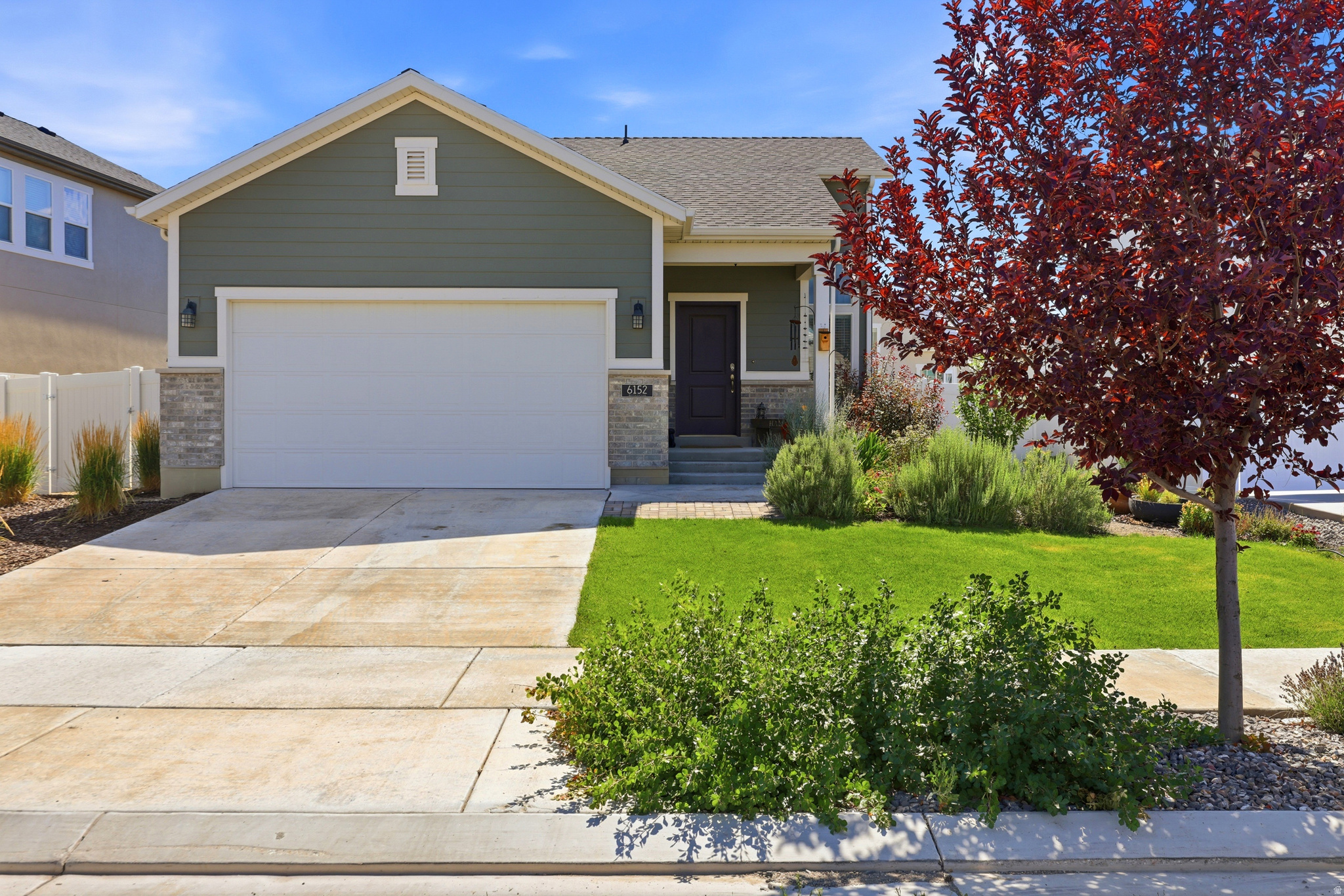 Welcome Home! Skip the wait-and the extra expense-of new construction. Miss the days of low interest rates? ASSUMABLE **3.875%** RATE!!! This beautifully finished, move-in ready rambler already includes the appliances, window coverings, landscaping, fencing, and upgrades buyers love. This charming home offers an inviting, open feel with abundant natural light from its large windows and desirable west-facing orientation. Enjoy bright, sun-filled living spaces throughout the day and relax in the shaded backyard during the afternoon and evening. The home features 3 spacious bedrooms, including a private primary suite complete with a large walk-in closet and an en suite bathroom featuring an oversized shower. The downstairs bedroom also boasts an impressive walk-in closet, providing exceptional storage and flexibility. Additional thoughtful upgrades include a high-quality water softener system, so hard water is one less thing to worry about. Need extra storage? The expansive crawlspace extends beneath the entire main floor, offering plenty of room for seasonal dcor, keepsakes, and more. Need to charge your electric vehicle? The garage is already equipped with an EV charging station! Step outside to a fully fenced, professionally landscaped yard with a patio, mature trees and plants, plus automatic and drip irrigation systems for easy maintenance. Located in the sought-after Overland community, you'll enjoy incredible neighborhood amenities including a city pump track, park, splash pad, private community pool, clubhouse, pickleball courts, and generous green space. Plus, you're within walking distance of both Frontier and Cedar Valley schools. This home combines the convenience of new construction with the comfort and value of thoughtful upgrades already in place. Come see everything it has to offer-you may just find your perfect next home!