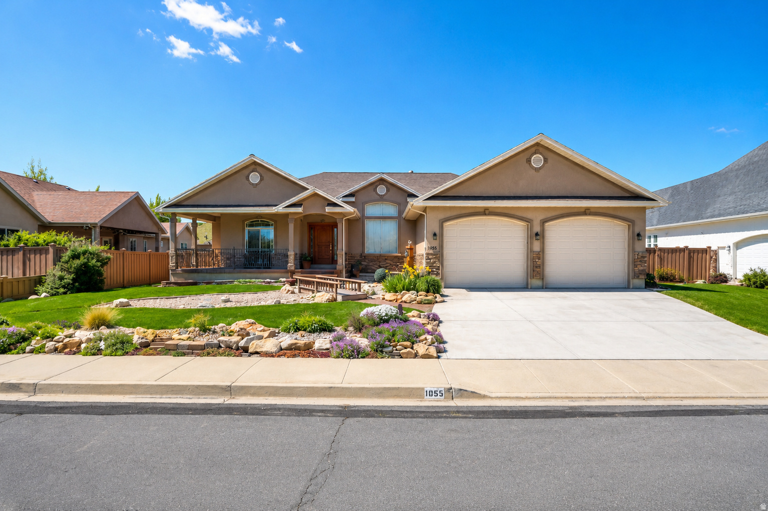 Welcome to this custom home in picturesque Mapleton, Utah! This stunning 7-bedroom, 4-bath residence seamlessly blends luxury with functionality, offering over 5,500 square feet of thoughtfully designed living space.  At the heart of the home, a grand great room creates the perfect setting for both relaxing and entertaining. The gourmet kitchen features high-end appliances, an expansive island, and ample workspace, making it ideal for everything from casual meals to hosting gatherings. Soaring 9-foot ceilings throughout the main level enhance the sense of openness and natural light.  Car enthusiasts and hobbyists will appreciate the exceptional garage setup, including a 30-foot-wide, extra-deep, extra-wide 2-car garage, plus a separate single-car detached garage-perfect for additional storage, a workshop, or recreational vehicles.  Step outside to enjoy true outdoor living with a covered deck, lush landscaping, and a peaceful waterfall feature that creates a private backyard retreat. The inviting front porch captures breathtaking views of Maple Mountain.  The versatile basement adds incredible value, offering 4 additional bedrooms, 2 bathrooms, a full kitchen, separate laundry, and a spacious family room, this is an 1847 sq. ft. ADU filled with natural light from large windows. With city approval for a separate entrance, this space is ideal for multi-generational living or potential rental income.   Retreat to the luxurious primary suite, designed as a tranquil escape with comfort and style in mind.  Don't miss your opportunity to own this exceptional Mapleton home-where space, beauty, and flexibility come together perfectly. 3rd car garage is a detached garage. 9' ceilings in the basement. There are 2 tours, a 3d Matterport tour and a video walk through tour located at the top of this listing.