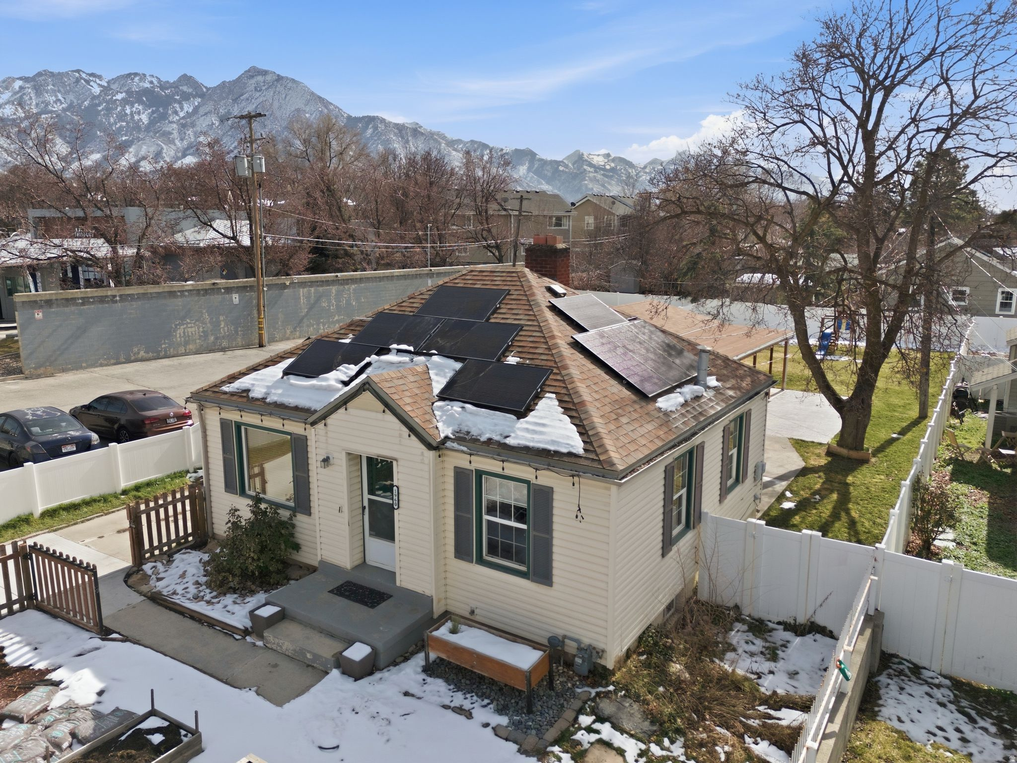 Located in the heart of East Millcreek, this RM zoned mixed residential property offers a compelling owner user or live work opportunity in a highly visible and accessible location. The existing structure has been used as a single family residence and is well suited for professional office, service based business, or continued residential use. The property features excellent parking with a detached 20 by 30 garage and a two car carport uncommon benefit for properties of this scale. Owned, solar panels provide long term energy savings, and recent improvements include an updated kitchen, updated bathrooms, water heater, new garage door, and more. The large, private backyard offers flexibility for outdoor use, storage, or future site planning, while programmable exterior lighting adds visibility and curb appeal. Positioned just minutes from Millcreek Canyon, Evergreen Park, and with quick access to the regional freeway system, this property provides strong connectivity to downtown Salt Lake City, the airport, Park City, and surrounding canyon communities. Zoned RM Residential Mixed, this property is intended as a transition zone between low density residential and commercial development, allowing for medium to high density residential and limited, neighborhood compatible commercial uses. Ideal for an owner user seeking flexibility, location, and long term upside.