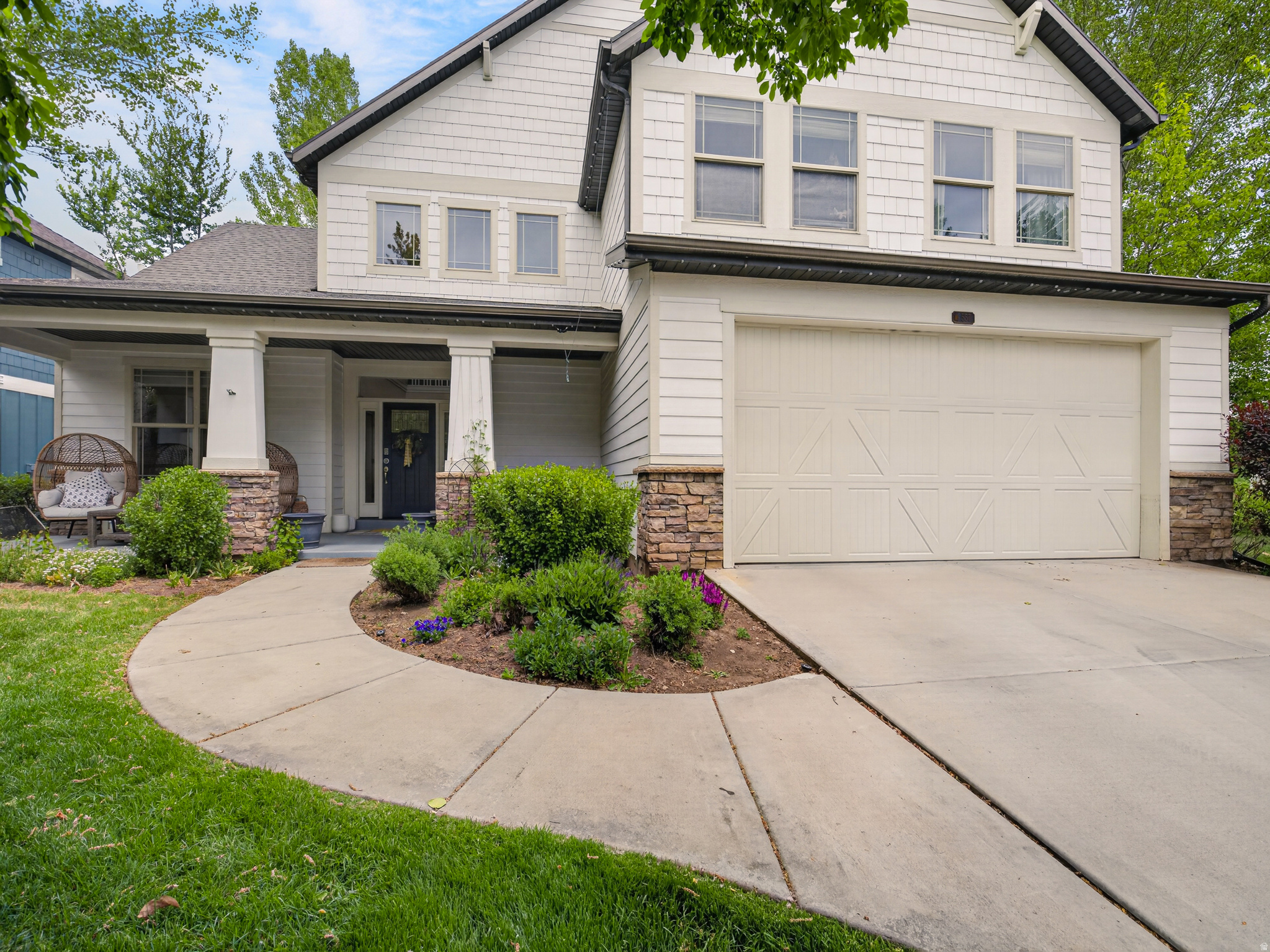 Tucked into one of Heber Valley's most coveted addresses, this thoughtfully designed 4-bedroom, 3.5-bath home on Craftsman Way offers the rare combination of mountain serenity and everyday convenience that draws buyers to Midway from across the region. The main-level primary suite is the centerpiece of a layout built for real life, keeping everything you need day-to-day on one floor. Upstairs, a generous loft anchors the secondary living space, flanked by three additional bedrooms, giving everyone room to spread out. Home to some of Utah's most spectacular hiking, biking, and golf. Deer Creek reservoir is so close you can create amazing summer memories. Also positioned within easy reach of Park City's world-class ski resorts, Deer Valley, and Sundance Mountain Resort. Whether you're chasing powder in winter or wildflowers in summer, the adventure begins practically at your doorstep. Midway itself is a gem: a charming Swiss-heritage town known for its hot springs, Swiss Days festival, and a tight-knit community feel that's increasingly rare along the Wasatch Front. This is an extremely desirable neighborhood, this is mountain living without compromise, where the views are real, the air is clean, and every season brings something worth staying for.