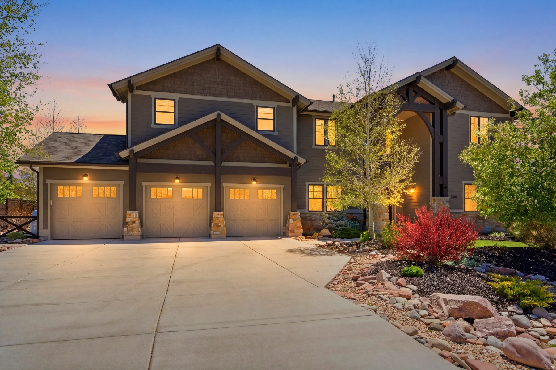 Exceptionally rare East Creek setting that feels nearly impossible to duplicate. As the most sought after lot in the neighborhood when sellers purchased, this home lives like a private oasis -- with no neighbors to the side or behind, and breathtaking panoramic mountain views. Surrounded by more than 35 mature trees, the grounds feel like a secluded haven designed for both tranquility and unforgettable entertaining. Every corner of the outdoor space has been thoughtfully curated into special escapes: soak beneath the stars in the hot tub, gather for candlelit dinners under the covered patio, unwind in a hammock beneath the trees, or simply take in the sweeping views and peaceful silence. Inside, a brilliant floorplan offers expansive, light-filled living with a dramatic great room framed by soaring floor-to-ceiling windows that bring the outdoors in. Rich architectural details elevate the entire home, including upgraded solid wood doors and baseboards that create the warmth and sophistication of a luxury mountain residence. The chef's kitchen is built to entertain on a grand scale -- featuring an oversized island, gas range with professional hood, abundant prep space, 3 ovens, and a spacious walk-in pantry. Whether hosting holidays, celebrations, or everyday gatherings, this kitchen effortlessly accommodates it all. The main level includes both an office and guest bedroom, offering flexibility for work or multigenerational living. Upstairs, you'll find two spacious guest bedrooms, a luxurious primary suite, and an oversized recreation room ideal for billiards, movie nights, game days, or media lounge. Additional highlights include a three-car garage, new driveway, meticulous maintenance throughout, and exquisitely landscaped grounds that make this property truly unforgettable.
