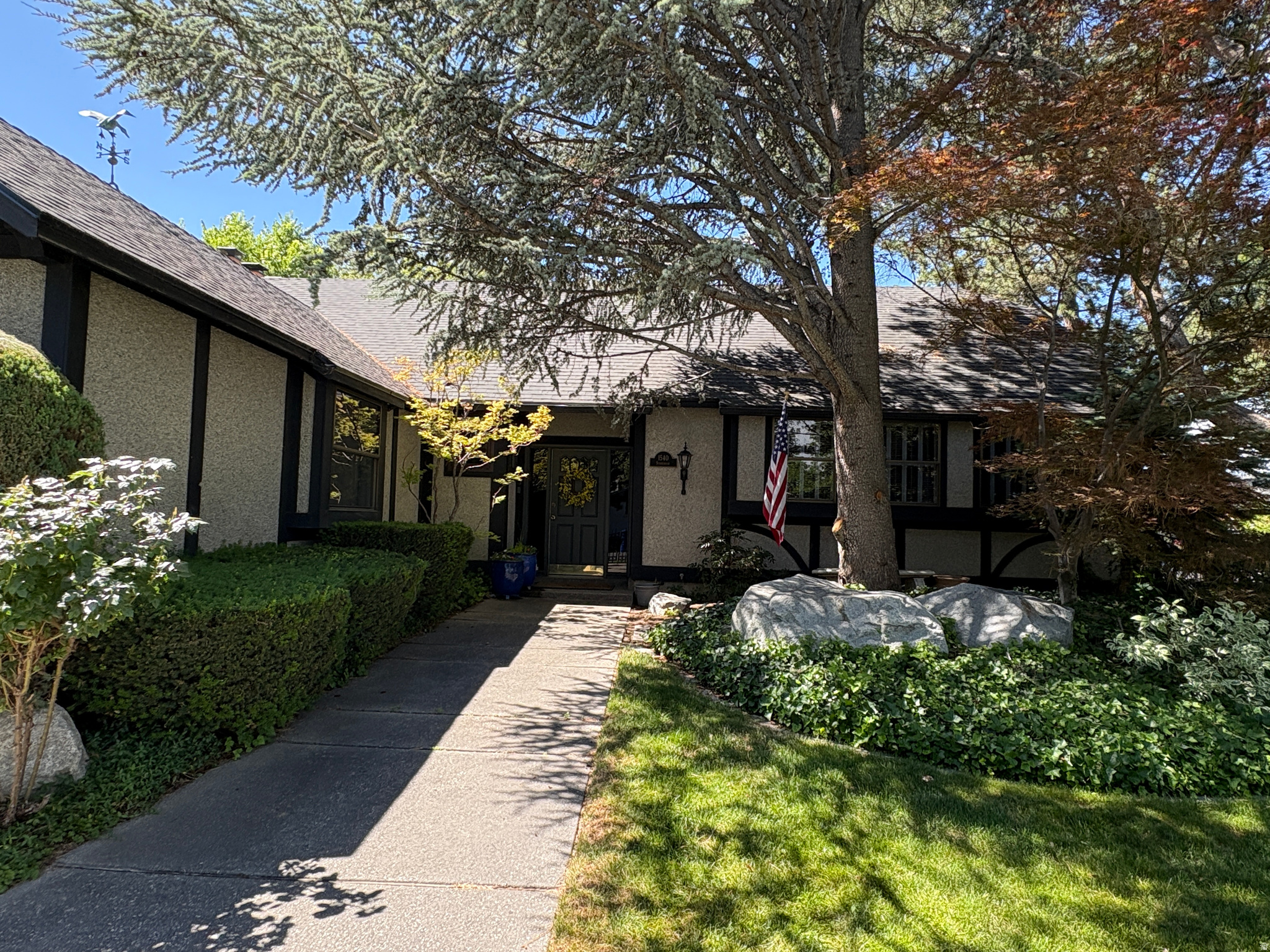 One-of-a-kind 1975 Parade of Homes rambler, full of original charm and endless possibilities! Yard and home have been meticulously maintained.  This spacious home offers 4 bedrooms with the potential for more, thanks to versatile den spaces off the bedroom and a large basement living area that can easily be adapted to fit your needs. You'll love the home's unique architectural details and design elements that make it truly stand out. Situated on an amazing corner lot in a highly desirable location and there's plenty of outdoor space to enjoy. Whether you're looking to preserve its retro charm or update it with your own modern touches, this home is a rare opportunity with incredible potential.
