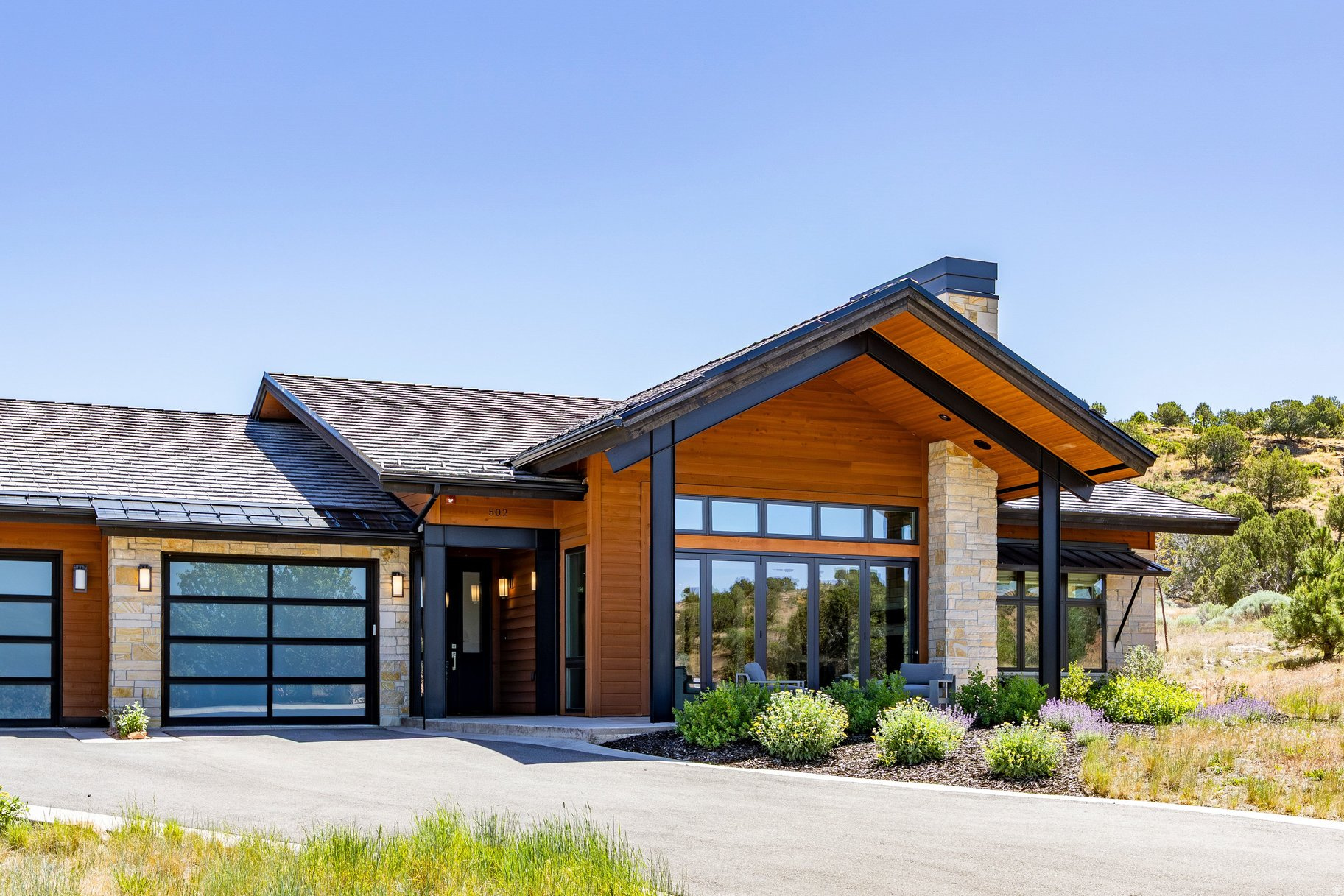 Experience elevated mountain living in the heart of Red Ledges. Built by Red Ledges Construction in 2023, this exclusive Village Center Cabin features a beautifully crafted three-bedroom residence designed for effortless luxury and year-round enjoyment. Ideally located just steps from the vibrant Village Center, homeowners enjoy unparalleled access to panoramic mountain views, the acclaimed Jack Nicklaus Signature Golf Park, a spectacular 144-foot waterslide, bar and grill, state-of-the-art wellness and fitness facilities, as well as premier tennis and pickleball courts. Thoughtfully designed with a desirable single-level open floor plan, this elegant villa features a gourmet chef's kitchen, spacious living and dining areas, and three generously sized en-suite bedrooms, creating the perfect balance of comfort, privacy, and functionality. Designer-quality finishes, inviting outdoor living spaces, and a tandem two-car garage further enhance the home's appeal, making it ideal for entertaining family and friends or enjoying a peaceful mountain retreat. Enjoy truly maintenance-free living, with landscaping and snow removal conveniently handled by the HOA, allowing more time to relax and take advantage of the exceptional amenities just outside your door. A coveted Red Ledges Golf Park Membership is available with a deposit, offering access to an outstanding collection of executive golf, recreational, social, and wellness amenities within one of Utah's premier private mountain communities. Whether you're seeking a full-time residence, a mountain getaway, or a lock-and-leave retreat, the Village Center Cabins offer an exceptional lifestyle defined by luxury, convenience, and adventure.
