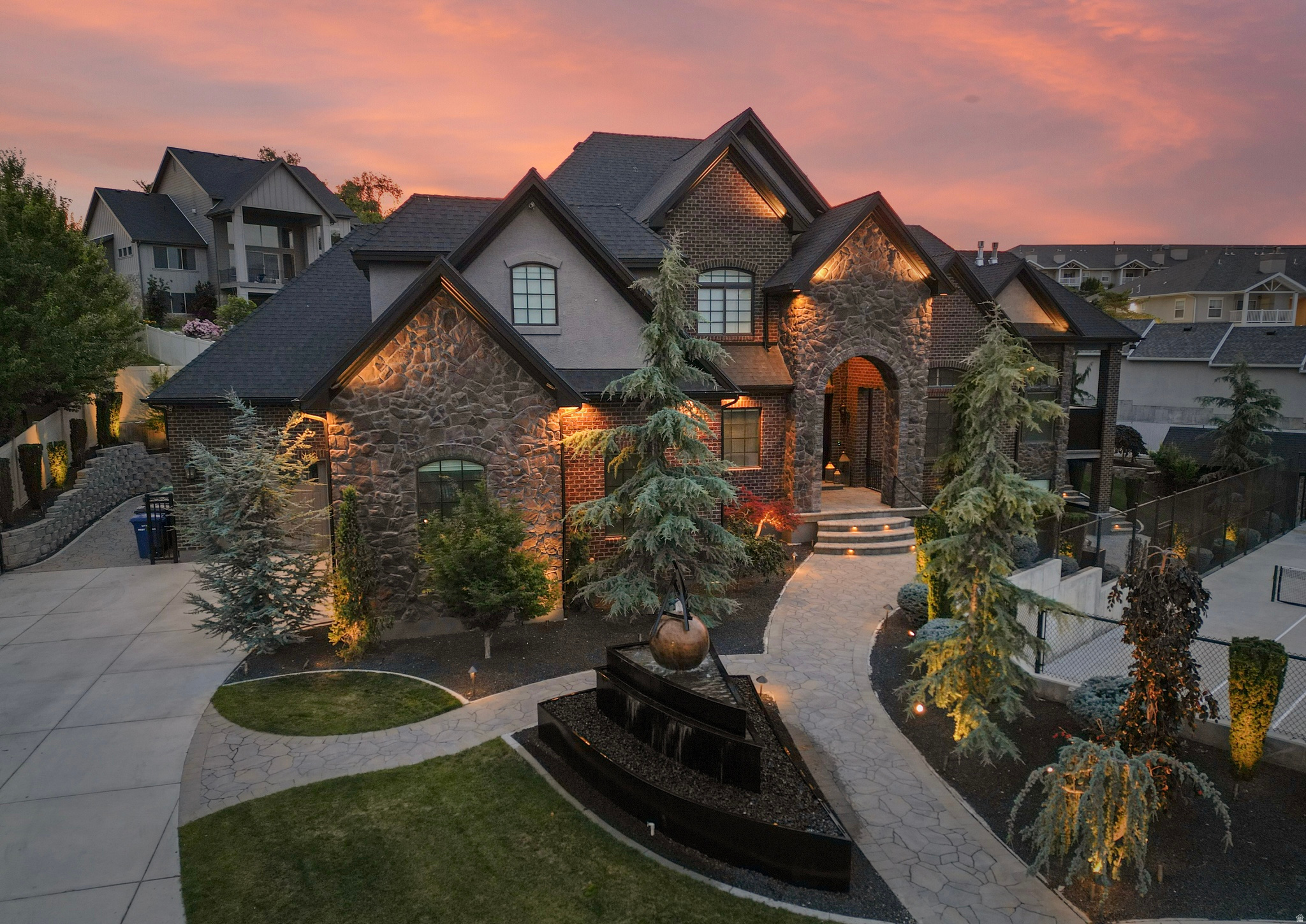 Turnkey Luxury Awaits: This exceptional estate is being offered completely fully furnished, presenting a rare, move-in-ready opportunity. Every room has been meticulously curated with top-of-the-line, classic Restoration Hardware furniture, premium bedding, and sophisticated lighting fixtures throughout. From the grand living spaces to the intimate bedroom retreats, the home embodies a seamless blend of timeless elegance and modern luxury, allowing you to move right in without missing a beat. Fairyland Dreams: Off of the main living areas lies an extraordinary, custom-built children's playroom designed to transport you straight into a fairy tale. Built with the premium quality, detail, and scale of a Disney-level attraction, this space includes a heavy-textured faux-tree structure, integrated hidden play areas, Three breathtaking Fairy homes and a magical loft with exquisitely custom-carved details, and enchanting themed hand crafted flower lights throughout shipped from Italy. It is a masterpiece of experiential home design. The Ultimate Family Entertainment Suite:  Beyond the fully integrated game area lies a breathtaking, custom-designed home theater and full-service family kitchen that redefines home entertainment. The state-of-the-art theater room boasts dramatic, backlit coffered ceilings and tiered plush leather seating, seamlessly flowing into a custom culinary space designed for family memory-making. The gourmet kitchen is thoughtfully equipped with a dedicated, child-sized wash and prep sink alongside dual built-in step stools, allowing little helpers to easily join mom and dad at the counter. Anchoring the space is a fully integrated concession wall featuring custom glass-front candy displays and a premium, built-in soft-serve ice cream machine. It is a whimsical yet masterfully crafted space designed for world-class hosting and unforgettable family nights.