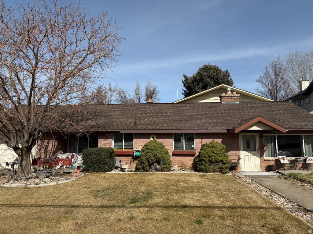 RICE REDUCED - Seller Financing Available! Gorgeous views surround this south-facing 7-bedroom home featuring a new roof and attached 2-car garage. Additional garage space, outbuildings, mature trees, fruit trees, garden area, water shares, and endless possibilities make this property truly unique. Conveniently located near several parks and outdoor recreation opportunities.