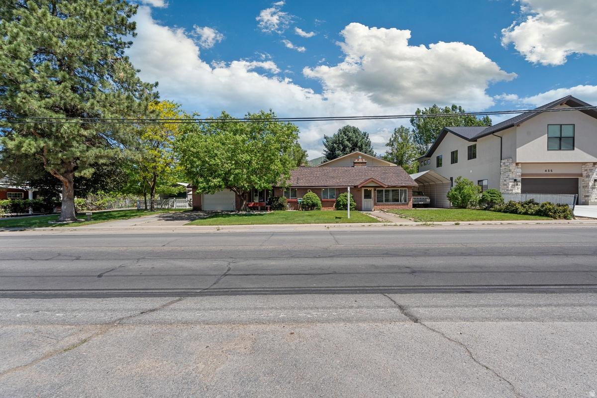 RICE REDUCED - Seller Financing Available! Gorgeous views surround this south-facing 7-bedroom home featuring a new roof and attached 2-car garage. Additional garage space, outbuildings, mature trees, fruit trees, garden area, water shares, and endless possibilities make this property truly unique. Conveniently located near several parks and outdoor recreation opportunities.