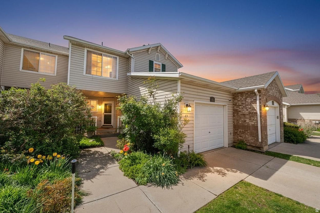 Step into your dream townhome, where charm and comfort come together beautifully. This inviting residence is filled with natural light from dramatic two-story windows, showcasing lovely views of the garden and patio. You'll also find a flexible room on this level ideal as a home office or additional bedroom. Upstairs, a spacious loft provides the perfect spot for a den, workspace, or reading nook. Two generously sized bedrooms each feature their own private bathrooms, ensuring comfort, privacy, and convenience. The lower level offers even more versatility with a fully equipped studio apartment, complete with a kitchenette, bathroom, bedroom, and living area perfect for guests. This one of a kind townhome blends character, functionality, and beautiful outdoor living spaces, an opportunity you won't want to miss. Conveniently located near shopping, freeway access, and a variety of restaurants. Square footage figures are provided as a courtesy estimate only and were obtained from County Records. Buyer is advised to obtain an independent measurement.