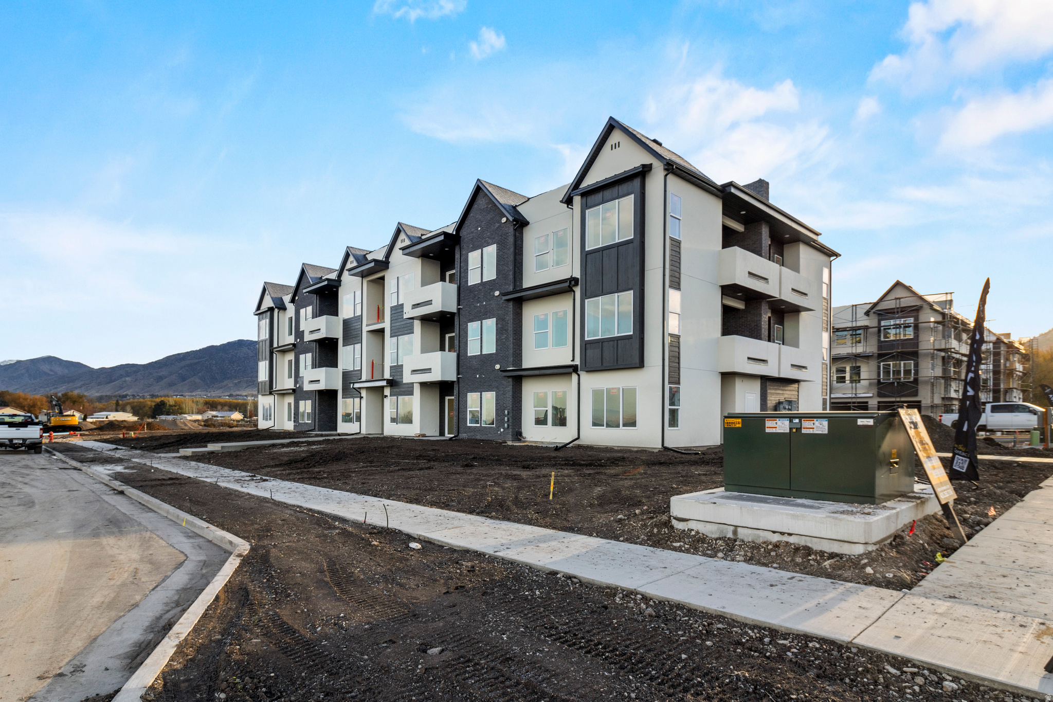 Get a heck of a value in the beautiful Ridgeline Park community in Nibley. This is a top-floor condo unit, with tons of natural light pouring in and not one, but TWO private balconies, one off the great room and one off the primary bedroom. Two large full bedrooms, 2 bathrooms, and a very easy-flowing layout with solid surface countertops throughout. An incredible opportunity to be a part of a neighborhood beaming with activity at one of the many in-community amenities, such as the pool, clubhouse, walking trails, pickleball courts, playgrounds, and a future 18-acre Nibley City park coming in a few blocks away.