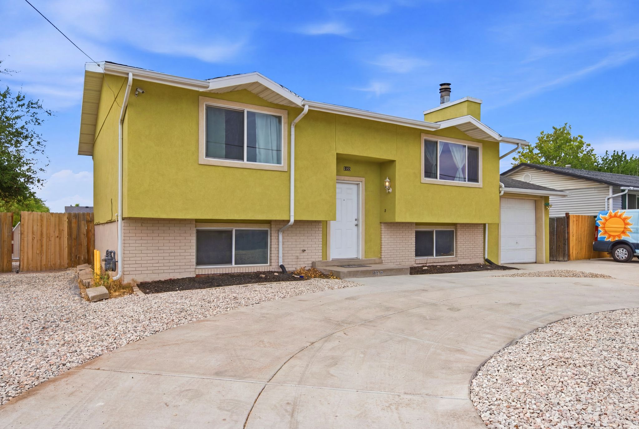 GRAND OPENING SATURDAY JUL 18, 9:30am-12:30pm. 6 BEDROOMS AT THIS PRICE??! This roomy house was updated 4 years ago and has so many options, from straight up family living to investment or house hacking. Upstairs you'll find two bedrooms, full updated bath, living room & fireplace, and an open updated kitchen with tons of cupboard space (soft close doors & drawers!). Downstairs are four more newly carpeted bedrooms with an updated bath, or go for three beds and a cozy family room... or convert the basement to a lockout ADU with its own separate walkout entrance. You'll love the deck for grilling & enjoying the evenings, watching the sunset hit the mountains and the family playing in the big back yard, but don't worry, the mostly xeriscaped lot means low maintenance and less water use. Huge shed and fenced open parking area (RV or boat parking!), and the circular driveway makes coming and going a breeze. The garage has a new opener too! Newer roof with water heater & HVAC installed two years ago. Close to freeways, shopping, restaurants, schools, & parks. Bring your ideas and come for tour, but be ready... you may never want to leave.
