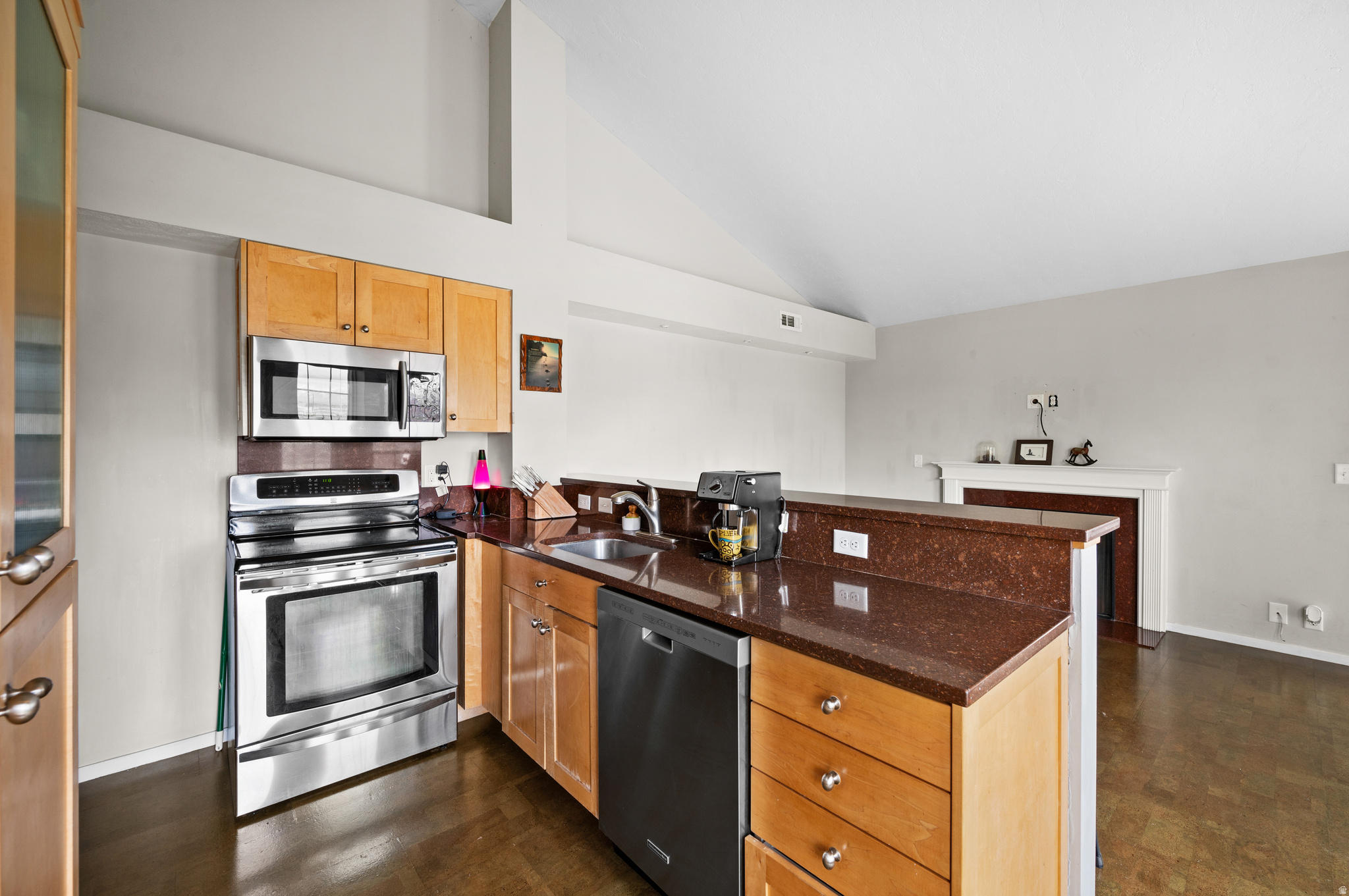 This one bedroom condo is located in the perfect spot with no buildings behind it. It is a top level corner unit with extra window, beautiful vaulted ceilings & located in a secluded location. The semi covered deck is perfect for grilling. Updated kitchen and bathroom with granite countertops and newer appliances. Stackable washer and dryer included. Minutes away from Jordan River Parkway walking trails next to the river that span miles from county to county. Easy access to freeway and nearby shopping. Square footage figures are provided as a courtesy estimate only.
