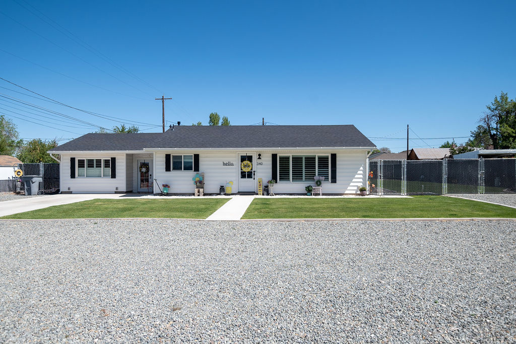 Step into timeless charm with this all-new, one-level farmhouse look home. Meticulously remodeled from top to bottom, this immaculate residence blends classic appeal with modern comfort for easy, stylish living. What you'll love: - All-new renovation inside and out: fresh finishes, modern moldings, new doors, and updated tile throughout - Open, one-level living with a warm, inviting farmhouse aesthetic - Brand-new essentials: furnace, water heater, and central air for year-round comfort - Bright, contemporary kitchen with new appliances - Plantation shutters that add curb appeal and adjustable light control - Exterior highlights: new cement, lush sod, curbing, and sprinklers for instant landscape perfection - Outdoor entertaining ready: spacious patio for gatherings - Practical extras: Conex storage on-site for added utility and a new fence for privacy and security Property features: - Farmhouse look with modern, high-quality finishes - One-level living for convenience and accessibility - New cement driveway and walkways - Fresh sod, curbing, and sprinkler system - Patio for outdoor entertaining - New furnace and water heater - Updated moldings, doors, and tile - New appliances in a bright, updated kitchen - Central air conditioning - Plantation shutters - Conex storage container - New fencing for privacy.