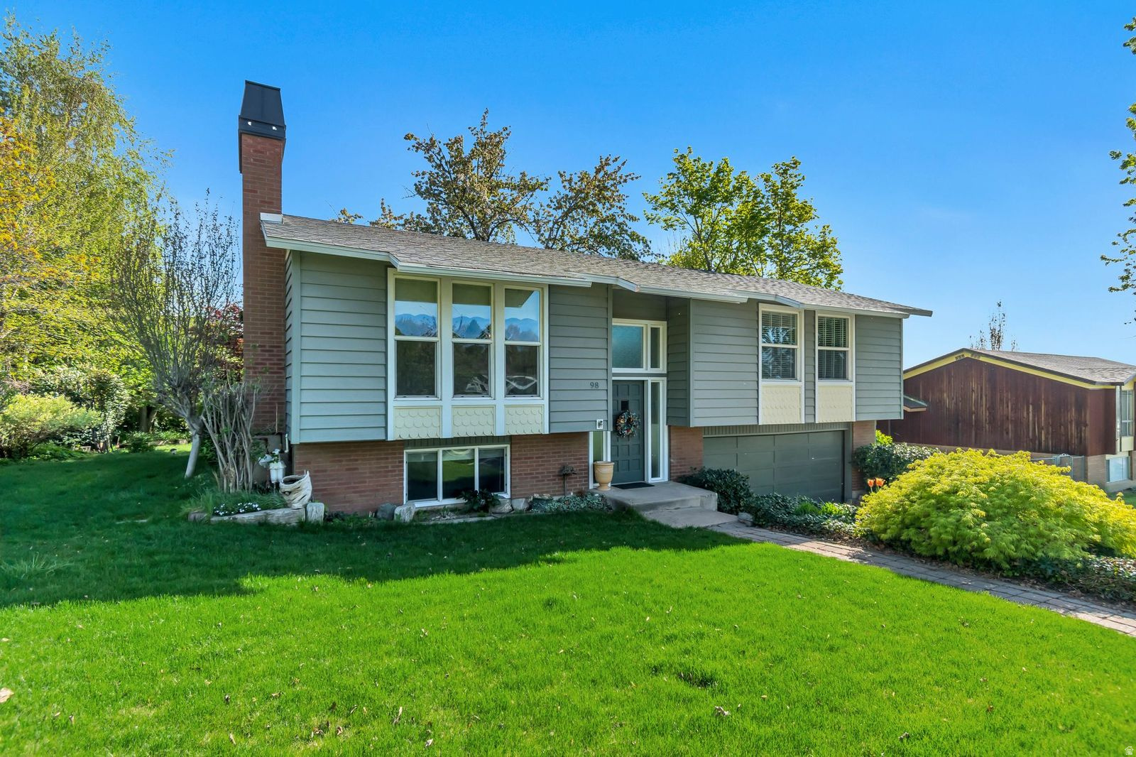 Situated in a beautiful neighborhood with mature trees and garden. This home is Ideally located just minutes from Lagoon, Station Park, shopping, dining and freeway access. The home features numerous updates including hardwood flooring, windows, newer roof, porch, furnace and A/C. Upstairs has beautiful fireplace with gas insert. This home is an unbelievable value and will go fast.  It is ready to move into. Agent is related to Seller. Square footage figures are provided as a courtesy only and were obtained from county tax records.  Buyer is advised to obtain independent measurement.