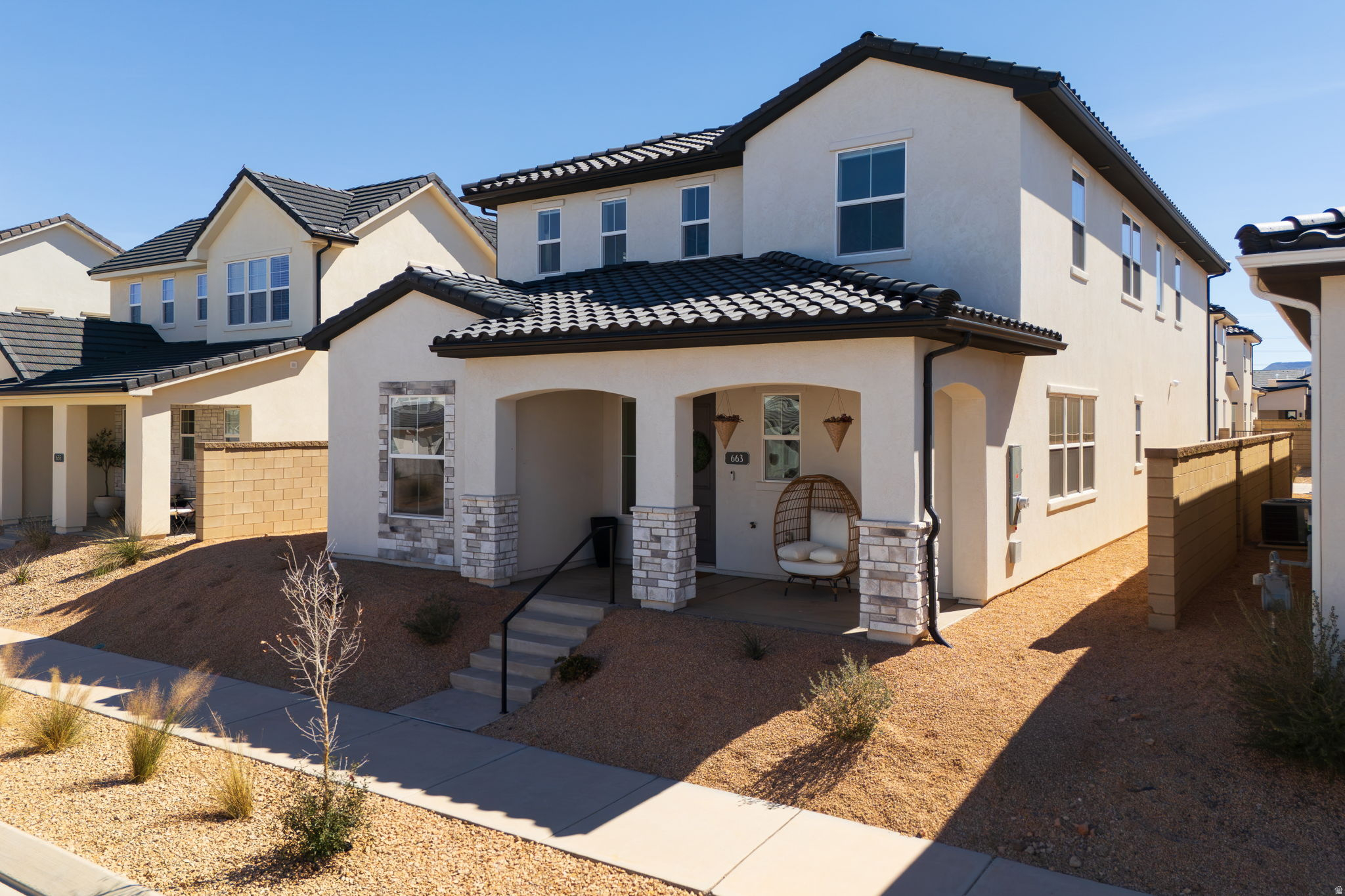 Better than new! Stunning, carefully designed Marina floor plan with upgraded hood vent, amazing color selections and spacious covered patio. The brown LVP floors and premium backsplash perfectly complement one another and make this home one you can't miss. Schedule a showing today!