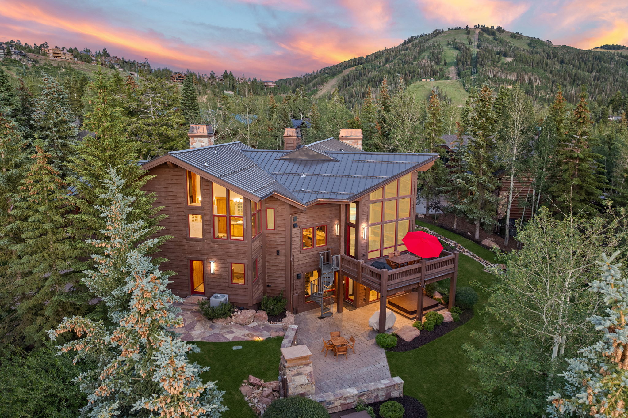 Legacy Property in the Heart of Deer Valley at Silver Lake!   Memories of a lifetime are made in an estate like this. A ski and summer home for family gatherings -- ski seasons, warm-weather evenings, and milestones shared across generations. Positioned in the coveted Knoll Estates enclave of Deer Valley, this rare offering delivers the full arc of mountain living: ski access, a naturally sculpted lot with a recirculating stream, and an architectural scale designed to bring families together without crowding anyone out.  At 7,315 square feet with six bedrooms and six and a half baths, the floor plan was conceived for the way multigenerational families actually live -- grandparents, parents, and kids each with room to breathe, and grand spaces to convene. The soaring great room with massive wood burning fireplace commands attention yet invites everyone in, anchored by a chef's kitchen built for the serious cook and the holiday crowd alike. Multiple bedroom suites -- each a private retreat -- means no one is settling for a guest room. Dedicated pool and game spaces keep every generation entertained.  Outside, the estate lot sets this property apart. The recirculating stream adds a natural, living quality to the grounds -- bringing wildlife to your doorstep -- while generous outdoor living areas invite long summer evenings, aprs-ski gatherings, and the quiet mornings that make mountain ownership worth every dollar. The lot's scale and privacy deliver a true estate feeling rarely found this close to world-class skiing.  Knoll Estates is among Deer Valley's most established and prestigious addresses -- offering easy access to the slopes while maintaining the seclusion and serenity of a private mountain retreat.