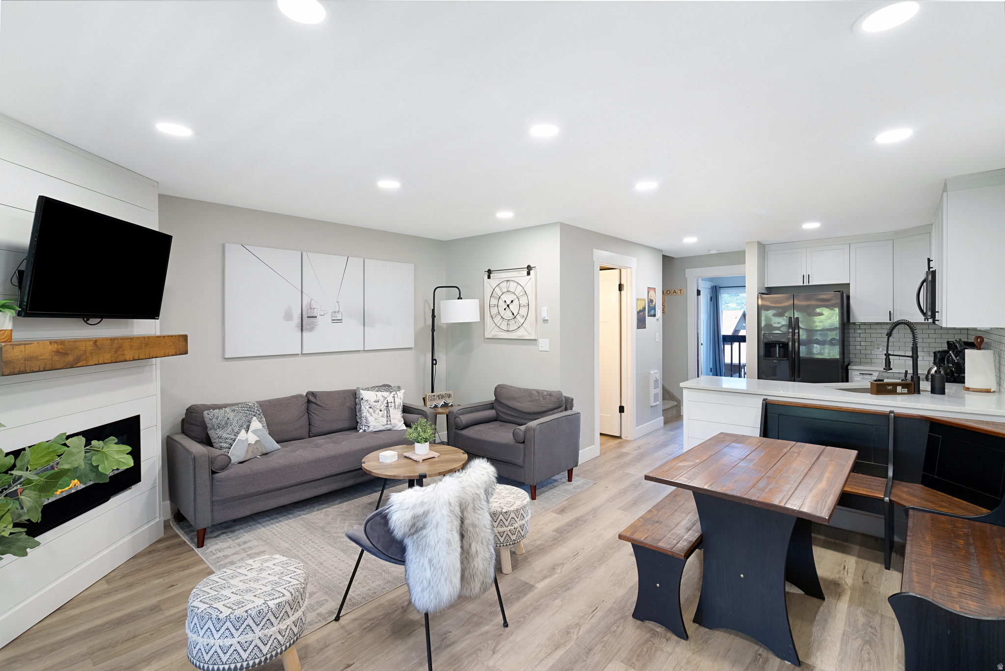 Have you been searching for a fully furnished year-round condo instead of just a winter ski getaway? This is the one! Perfectly located in the heart of Ogden Valley with quick access to Powder Mountain, Snowbasin Resort, and Pineview Reservoir, this property offers endless opportunities for adventure in every season. Enjoy hiking, biking, boating, paddle boarding, skiing, snowmobiling, golf, and more-all just minutes away.  Whether you're looking for a nightly rental investment, a personal vacation retreat, or both, this condo checks all the boxes. Take advantage of the area's continued growth while generating income and building future equity.  Fully renovated and completely turnkey, this unit features new flooring, fresh paint, an updated kitchen, and an interior washer/dryer combo. The open-concept family room and kitchen create the perfect space for entertaining, while the cozy fireplace adds warmth and charm after a day outdoors.  Fabulous community amenities include pool, hot tub, tennis/pickleball courts, mini golf, and BBQ areas.  Ready for immediate enjoyment or rental use!