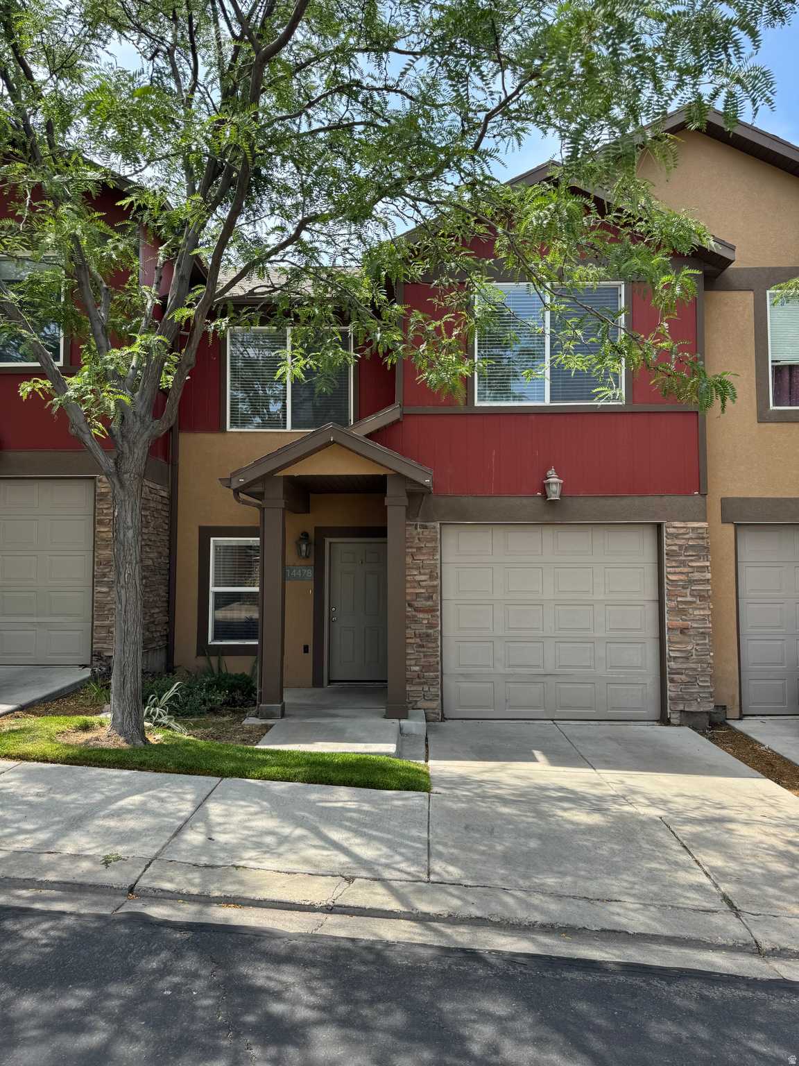 The rarest in the community! This unique home is the only one in the development that includes ownership of a large detached garage just steps from the front door (see photos), providing additional secure 1-car parking as well as ample storage space. Beautiful upgrades to the interior include LVP flooring, tile and newer carpet. Community amenities include pool, spa and workout facility. Great schools and convenient proximity to prime shopping and dining at Mountain View Village and the upcoming Commons at Herriman Towne Center.  Square footage figures are provided as a courtesy estimate only and were obtained from the owner. Buyer is advised to obtain an independent measurement.