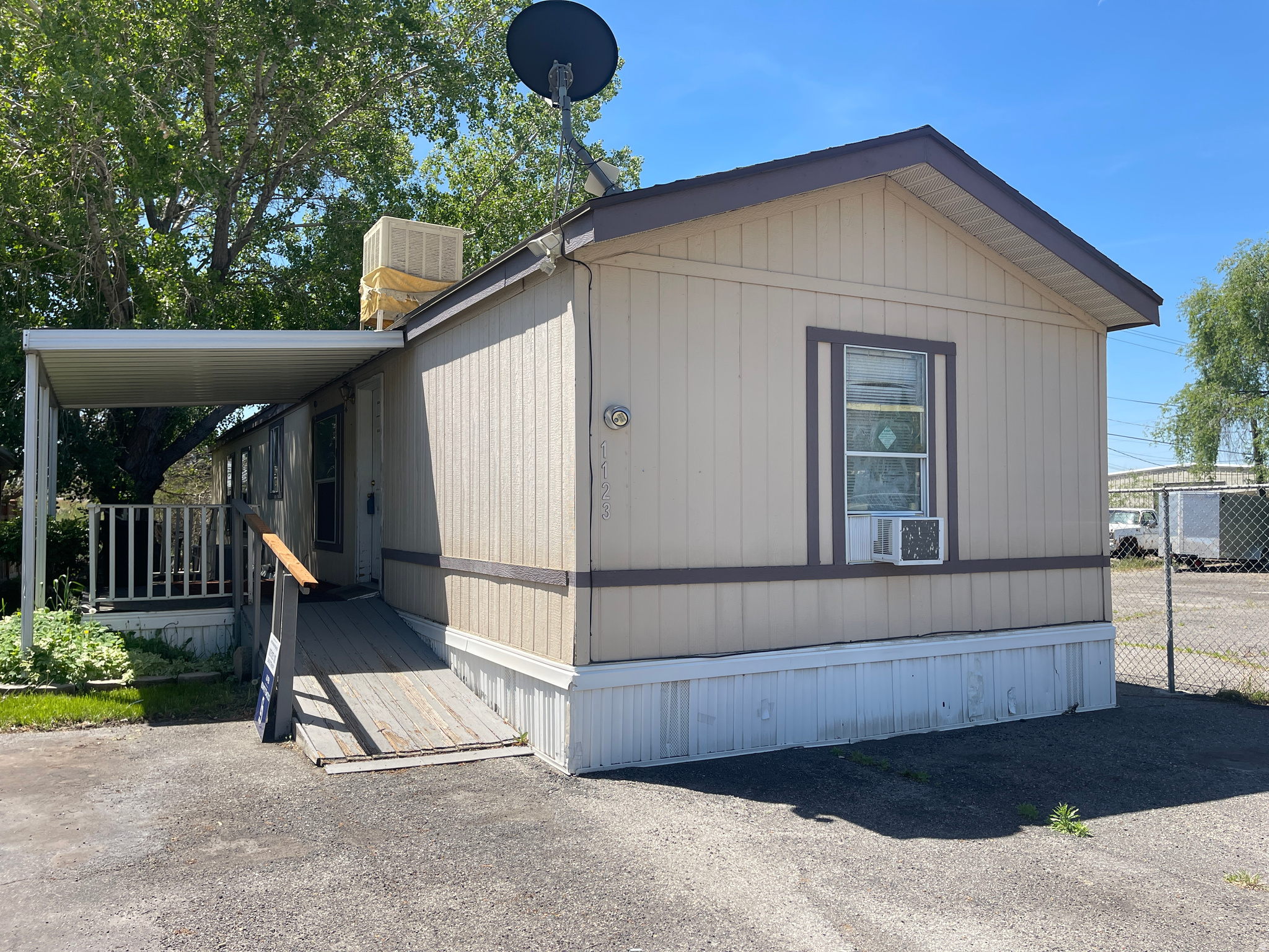 Welcome to the Francis K Community - a quiet, friendly, and well-maintained neighborhood known for its safe atmosphere and reasonable park management. This home offers a great opportunity to add your own personal touches and build equity with some cosmetic updates, including flooring and possible cabinet improvements. Conveniently located just minutes from shopping, dining, entertainment, and freeway access, making commuting simple while still tucked away from heavy traffic. Utah Lake is only a short drive away for outdoor recreation and beautiful views. Affordable living in a central location with tons of potential! Water heater replaced within the last couple years as well as Air conditioning unit.