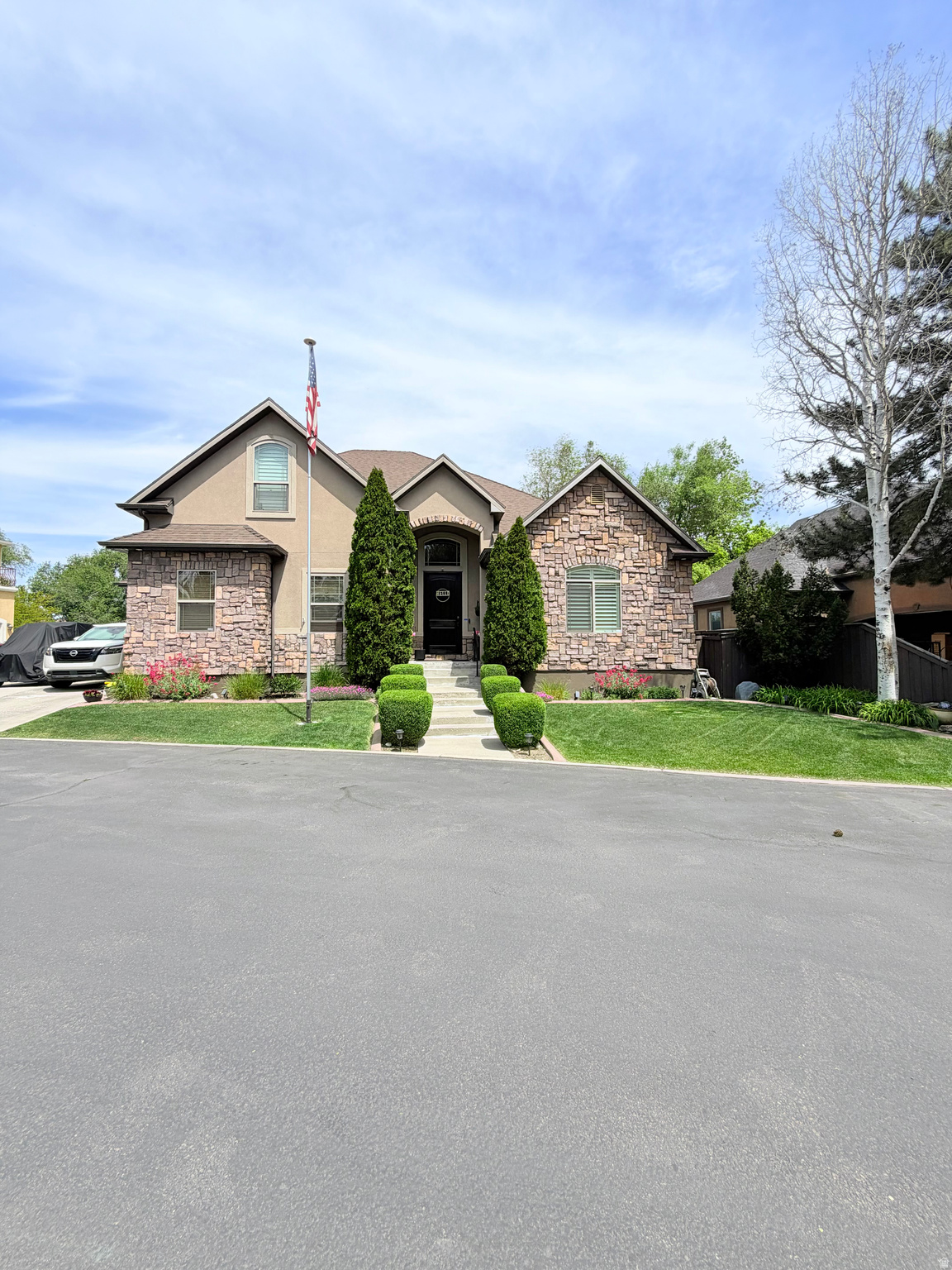 *Agent is Related to Seller*  *Motivated Seller* Beautiful well maintained custom home nestled on a quiet private drive in a highly desirable area near UVU, shopping, dining and easy access to I-15.  This home offers exceptional location, amazing storage and privacy. Step inside through the large front door with vaulted ceilings that give a grand entrance feel. There are custom finishes throughout, the master suite offering vaulted ceilings, spa-like bathroom complete with large tub, separate shower, spacious walk-in closet and a bidet.  Main living area is spacious with an open concept, connecting kitchen to living room. Must have large pantry! The home includes, main floor master bedroom, laundry and  bath. Upstairs has two bedrooms with walk-in closets, 1 full bath and large loft area with endless possibilities for use. Basement has additional  bath, cold storage and additional storage rooms and large living area is separated from the basement apartment. The basement features a walkout entrance, large windows and 9 foot ceilings. The apartment has two bedrooms, full kitchen, full bath and family room.  Additional laundry hook ups located in garage.  It has been rented for $1700/month.  Peaceful backyard with terraced landscape. Large raised garden boxes and new large 10x20ft storage shed with loft and 10x10 shed designed to match the exterior of the home.  Additional highlights include a 3-car garage with RV parking on the side, radiant floor heating,  central vacuum system, and new furnace and a/c from 2023. Water heater replaced in 2022 and boiler replaced in 2020.  The whole home water filtration system and water storage is not included with the purchase of the home but if buyer is interested, we can get more information on it. If buyers do not want the system it will go with sellers. Company information can be provided to discuss purchase to leave system in home. Fiber internet availability, and recent updates including leaf filter on all gutters with transferable lifetime warranty.  A wonderful place to create lasting memories-don't miss this opportunity!