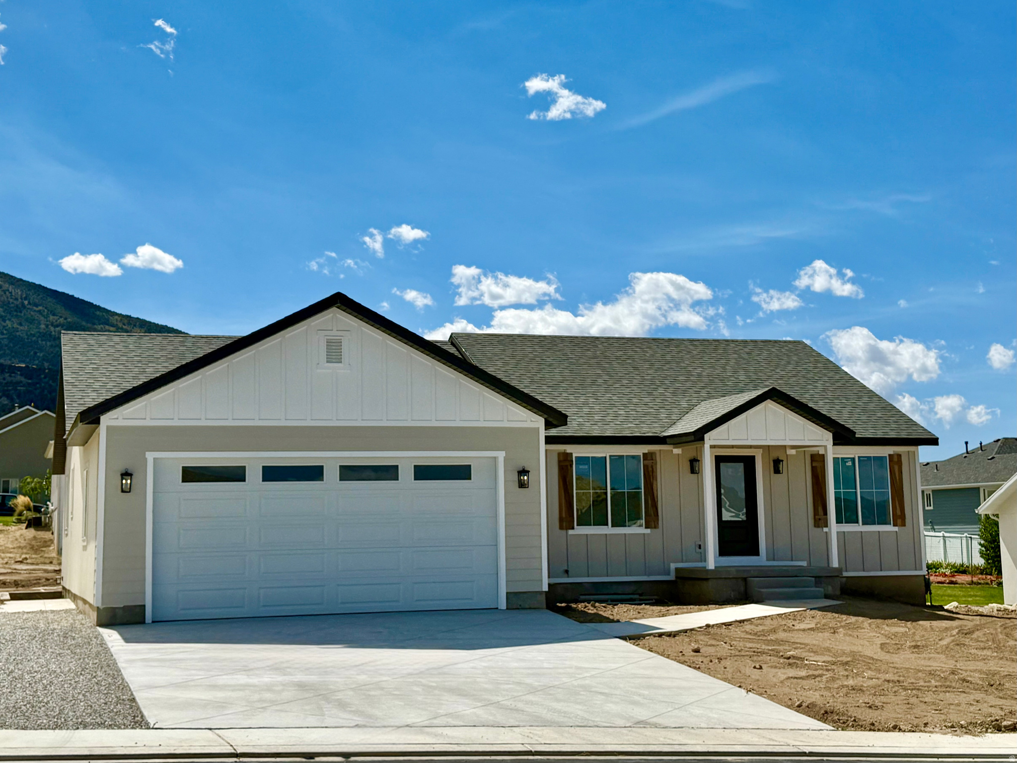 Welcome to this gorgeous new build in the heart of Manti! Featuring 6 spacious bedrooms and 3 modern bathrooms, this beautifully designed home offers the perfect blend of comfort and elegance. The open-concept floor plan is highlighted by vaulted ceilings and large windows, creating a bright, airy living space filled with natural light. The gourmet kitchen features custom cabinetry, granite countertops, premium finishes, and top-of-the-line appliances-perfect for both everyday living and entertaining. The luxurious primary suite offers a private retreat with a beautifully appointed ensuite bath. The fully finished basement includes a second kitchen and a separate walkout entrance, making it ideal for guests, multi-generational living, or potential rental income. Step outside to a large backyard with stunning mountain views, providing the perfect setting for outdoor gatherings, recreation, or quiet relaxation. This exceptional home combines modern living with the breathtaking beauty of Utah's natural landscape. Square footage figures are provided as a courtesy only. Buyer and buyer's agent are advised to obtain an independent measurement and verify all information. Earnest money to be held at the buyer's or seller's title company.
