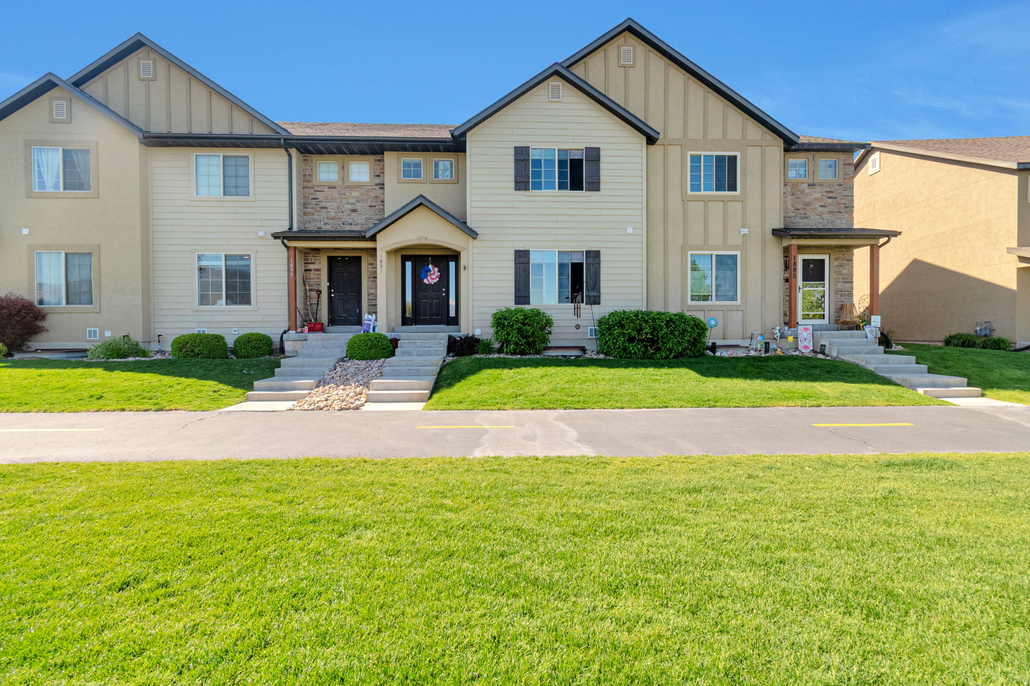 This beautiful home is loaded with upgrades and details throughout! This spacious 4 bed/3.5 bath townhome features an open floor plan that can accommodate family and friends for all your entertaining needs. The kitchen offers lots of cabinets and countertop space, stainless steel appliances, and a large Island. The oversized primary suite features vaulted ceilings, a cozy sitting area, and a private ensuite bath with double sinks, tub/shower combo, and a large walk-in closet. An upstairs loft provides flexible space for a home office, study nook, or additional living area. The fully finished basement includes a large rec room, full bathroom, and fourth bedroom that is already plumbed for a potential in-home salon, hobby room, or workspace. Don't forget to check out the 2-car garage!  Amenities include multiple playgrounds, large common areas, basketball court, and a clubhouse. Enjoy stunning mountain views from the living room and primary bedroom while being conveniently located near parks, schools, shopping, and other local amenities.