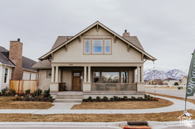 To be built by Goodboro Homes, this stunning Craftsman model is located in the desirable Holdaway Fields neighborhood in Vineyard. The home features a beautiful kitchen, an open floor plan with plenty of windows for natural light, and gorgeous upgraded finishes throughout. The spacious primary suite boasts his & her walk-in closets for added convenience and luxury. Designed for main floor living, this home provides everything you need on the main level with the option to finish the basement for even more space. Located in the heart of Utah County, you'll be just minutes from the Utah Lake trail system, Sleepy Ridge Golf Course, Megaplex, Top Golf, shopping, dining, and more. The community will include 162 homes, a clubhouse, swimming pool, and pickleball courts. Holdaway Fields embraces traditional Utah architecture with classic cottage, craftsman, and tudor style homes. Homes in this community intentionally define the street edge with open yards, front porches, and beautiful entries. A designated portion of this community is reserved exclusively for adults 55+, offering an ideal blend of comfort, convenience, and connection.