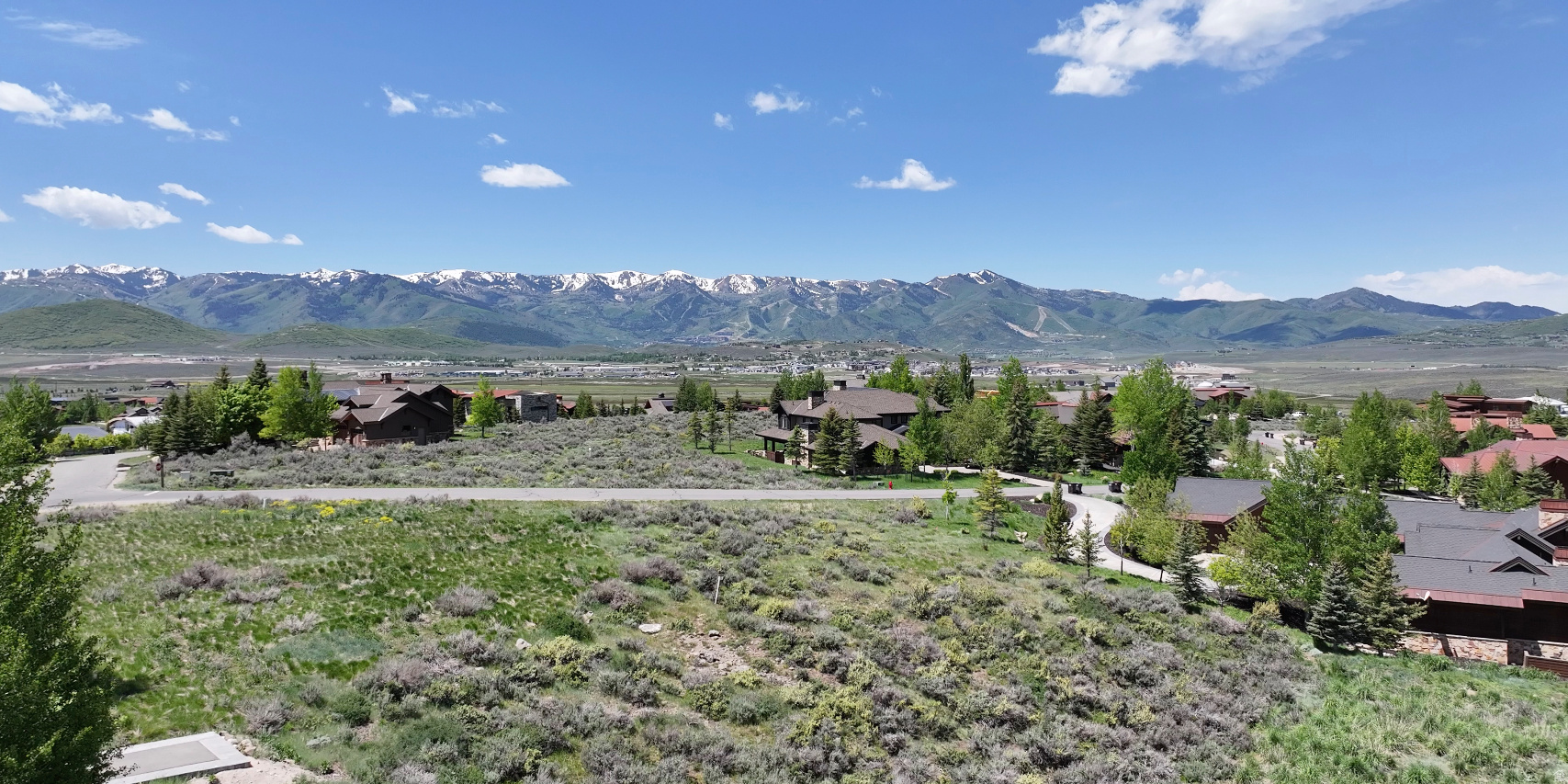 A rare opportunity in Promontory's coveted Homestead neighborhood, making this homesite especially compelling for luxury buyers. Design and build a custom home with the architect of your choice on a gently sloping, mostly flat build pad-an ideal foundation for bringing your vision to life.  This exceptional lot offers sweeping western and northern views and backs to dozens of acres of federally protected open space, providing privacy, serenity, and enduring scenery. Conveniently located less than five minutes from the Equestrian Gate, Dye Clubhouse Village amenities, and the Beach at Promontory, the setting balances accessibility with tranquility.  With an attractive price point and premier location, this parcel is well-suited for a full-time custom residence, a spec build, or acquisition as a Membership Lot. An outstanding opportunity in one of Promontory's most desirable communities.